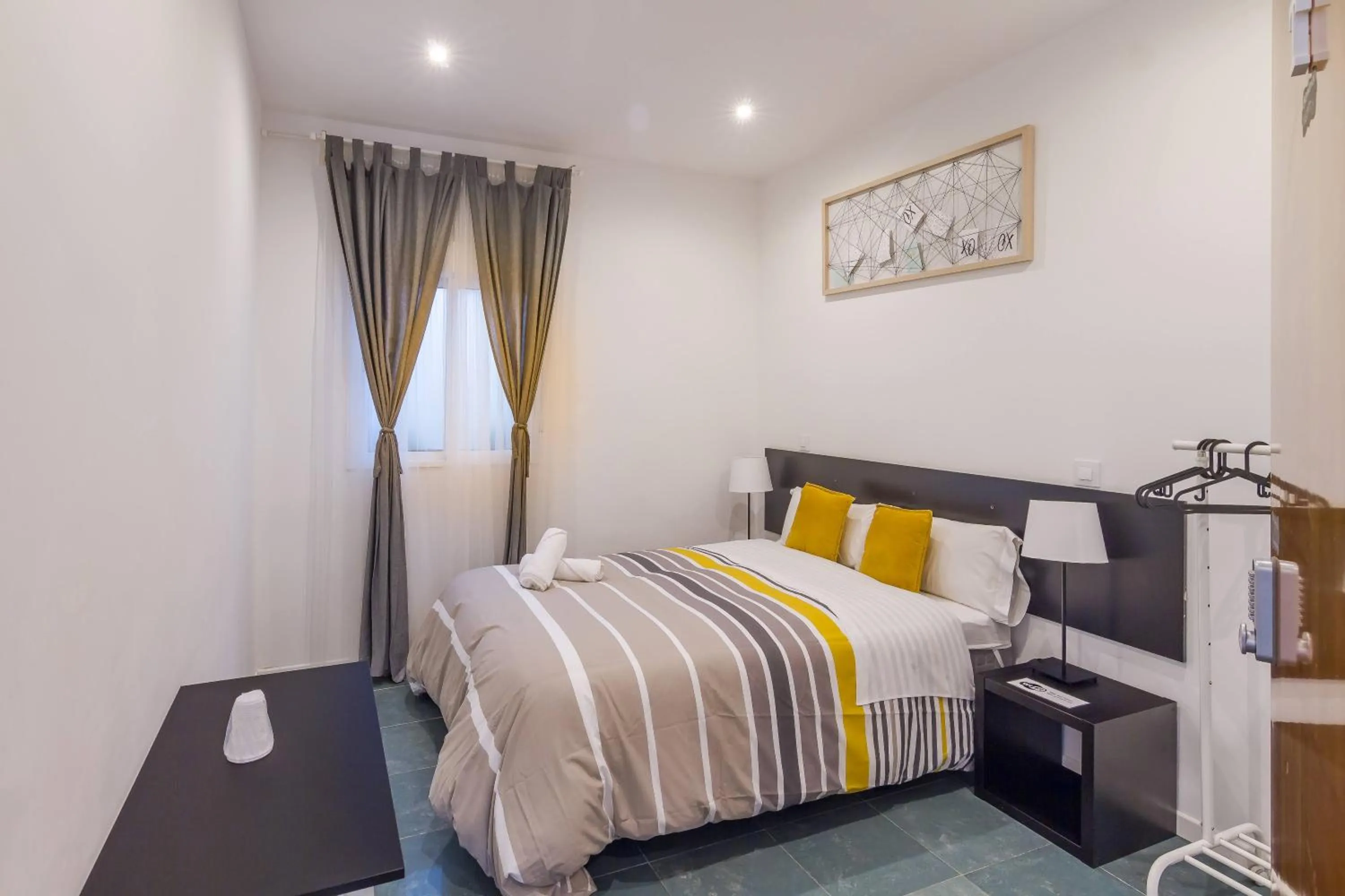 Bed in AYZ Javier Cabrini - Auto check-in property