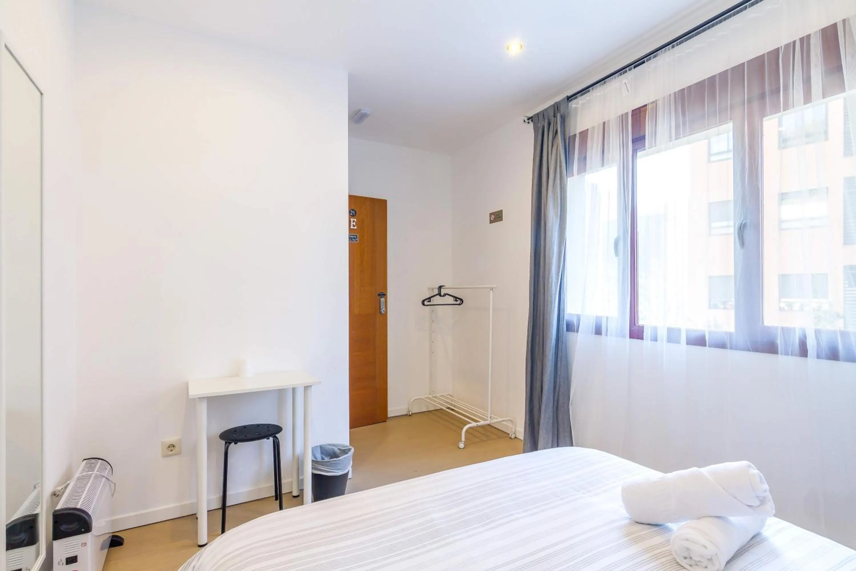 Bed in AYZ Javier Cabrini - Auto check-in property