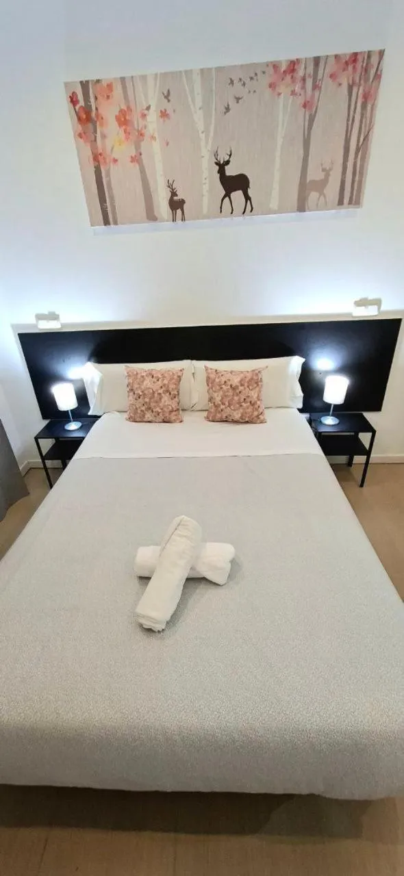 Bed in AYZ Javier Cabrini - Auto check-in property