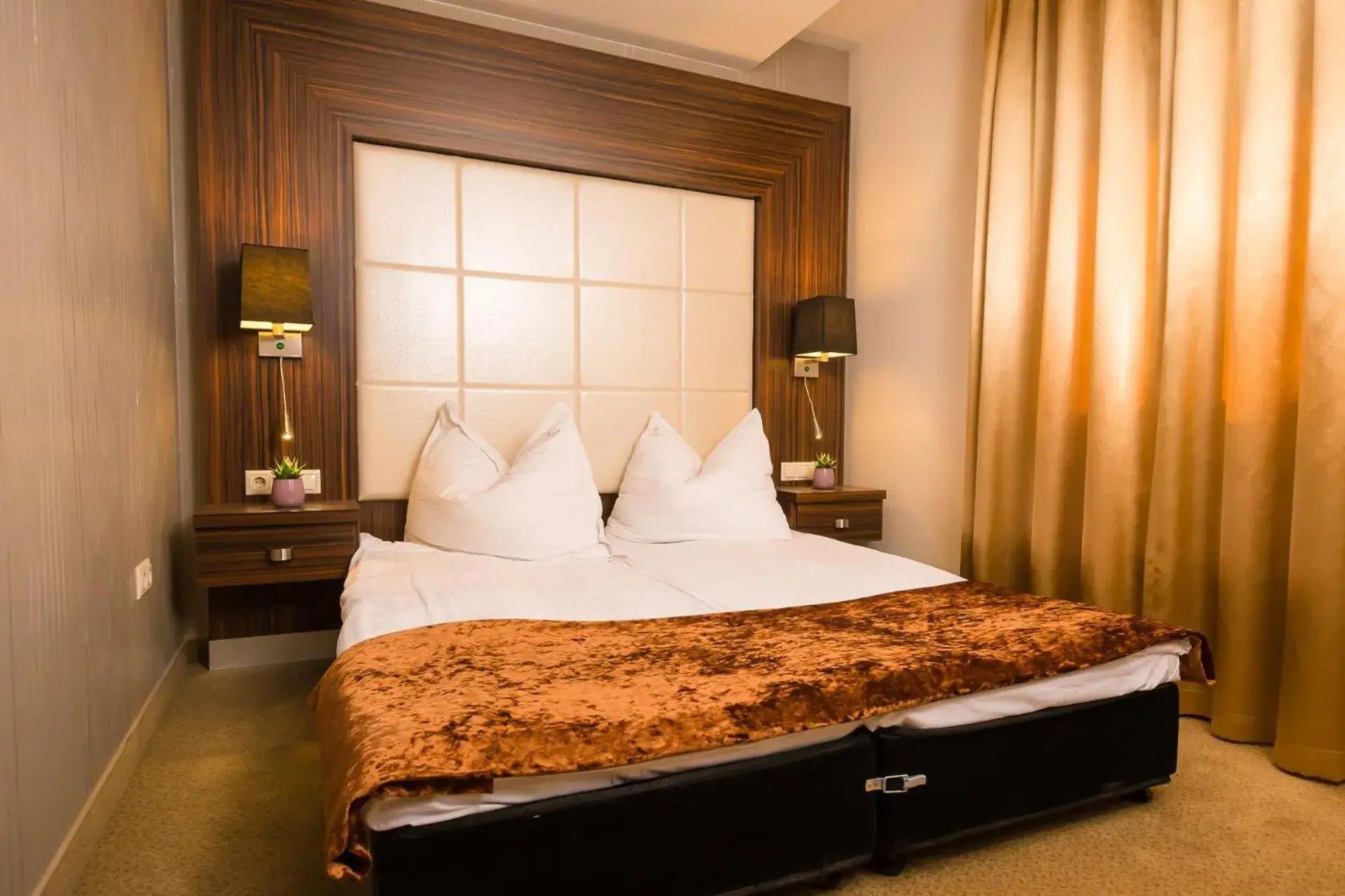 Bed in Duna Garden Hotel Bed in Duna Garden Hotel