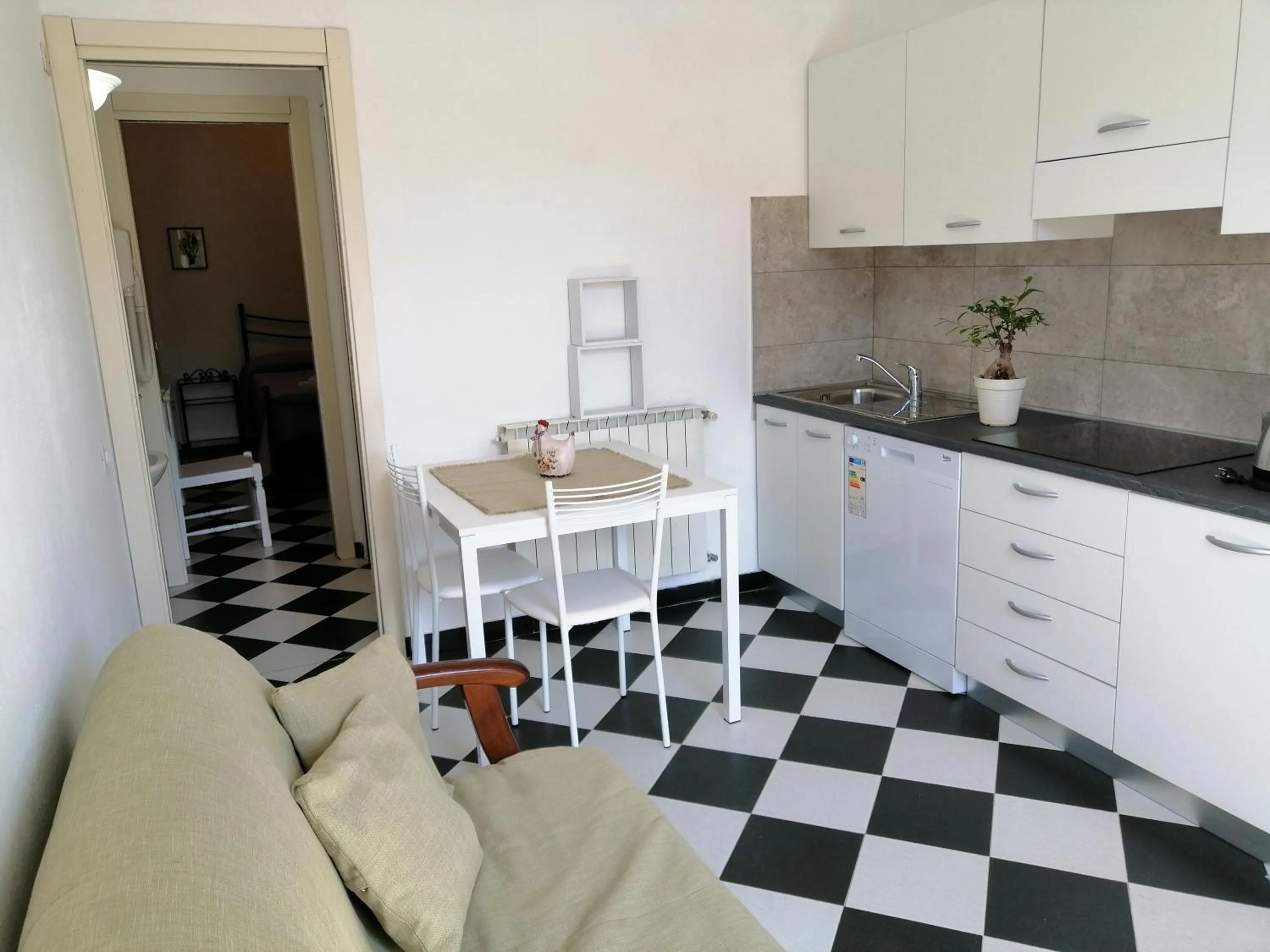 Kitchen or kitchenette in Affittacamere Mariella