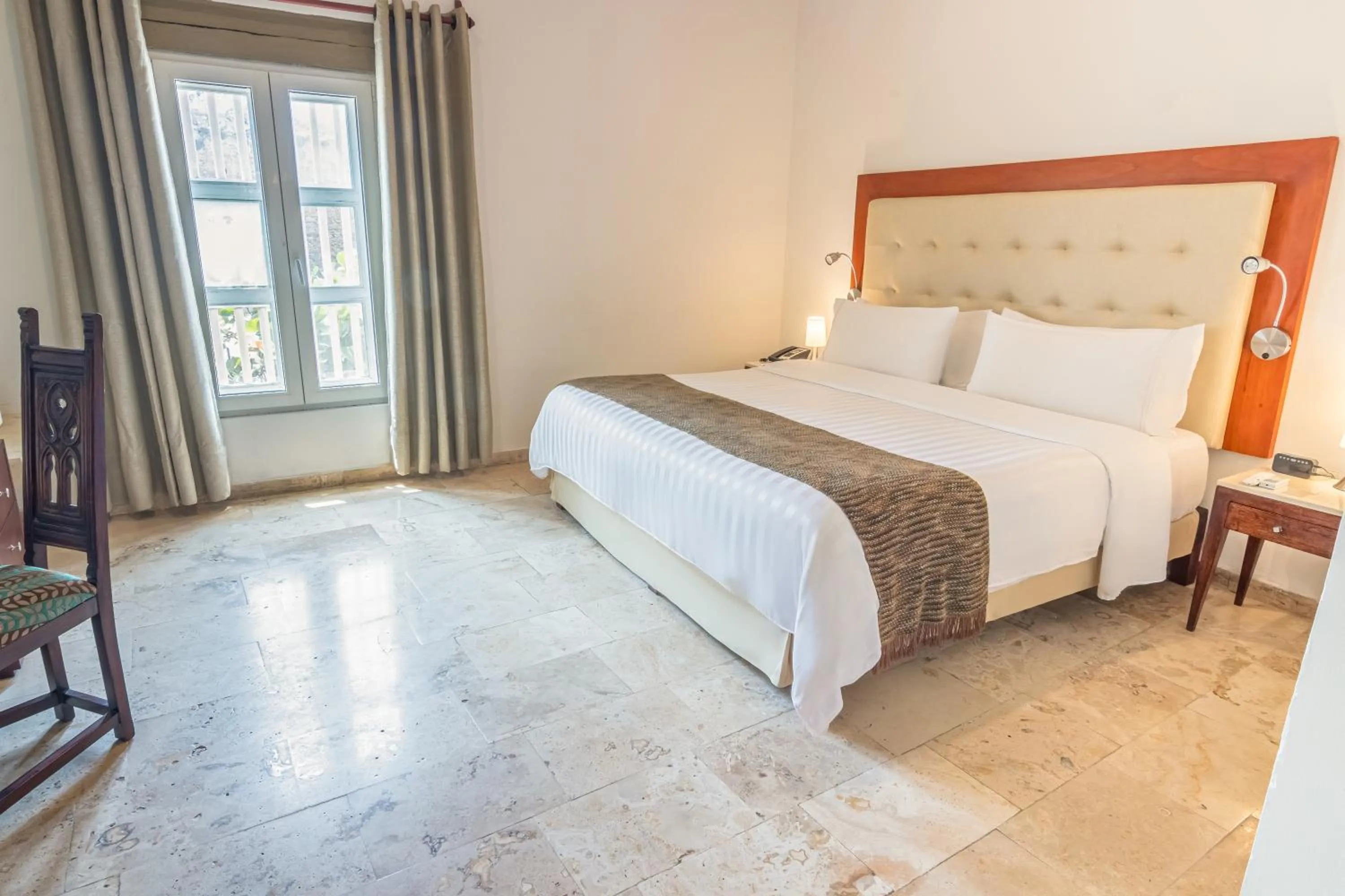 Photo of the whole room, Bed in GHL Collection Armería Real Hotel