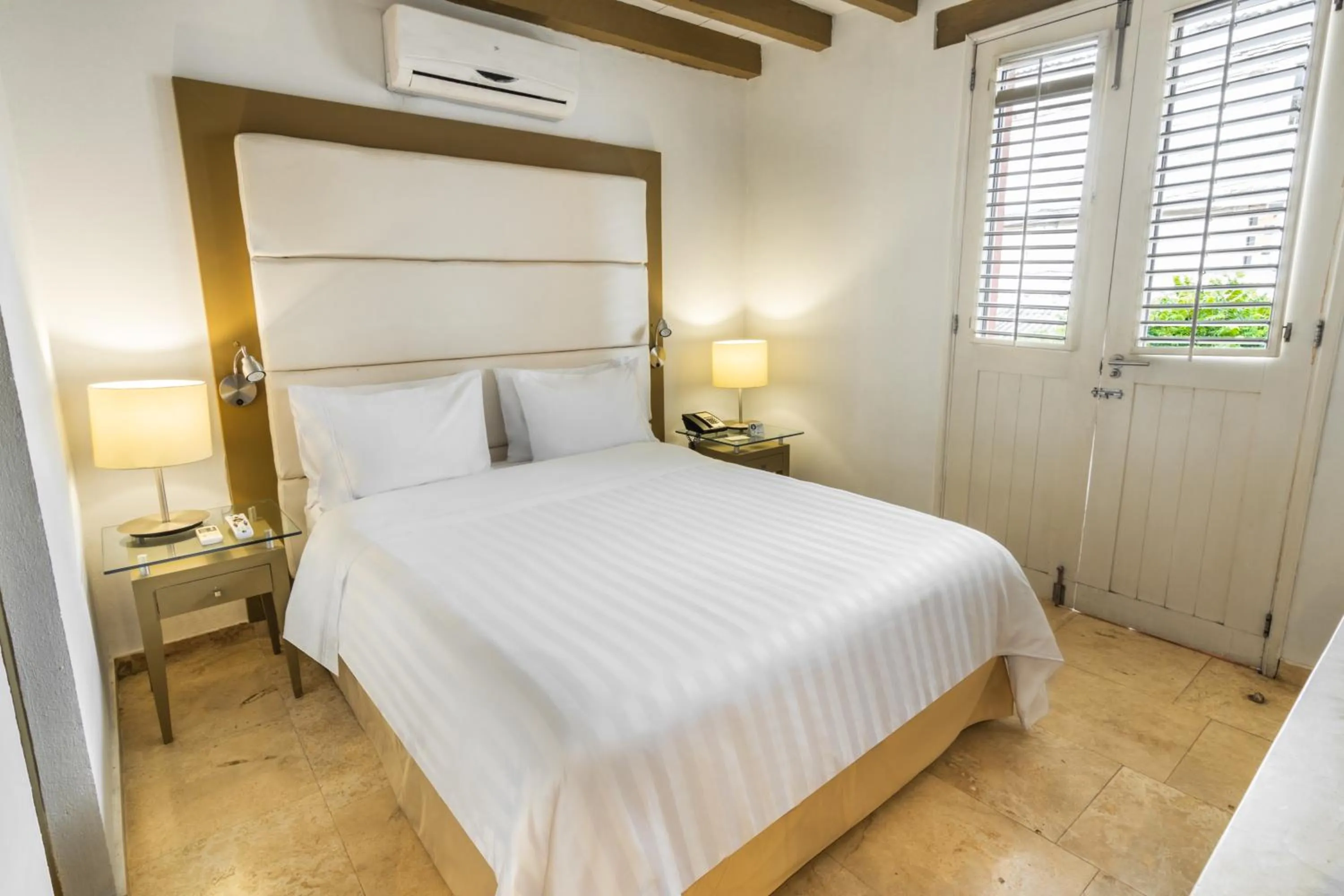 Photo of the whole room, Bed in GHL Collection Armería Real Hotel