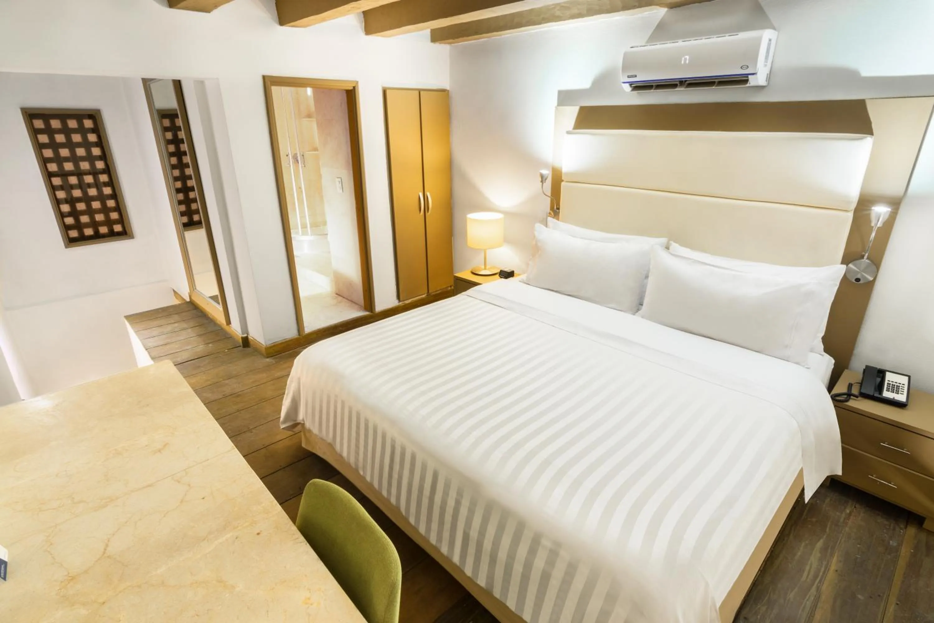 Photo of the whole room, Bed in GHL Collection Armería Real Hotel