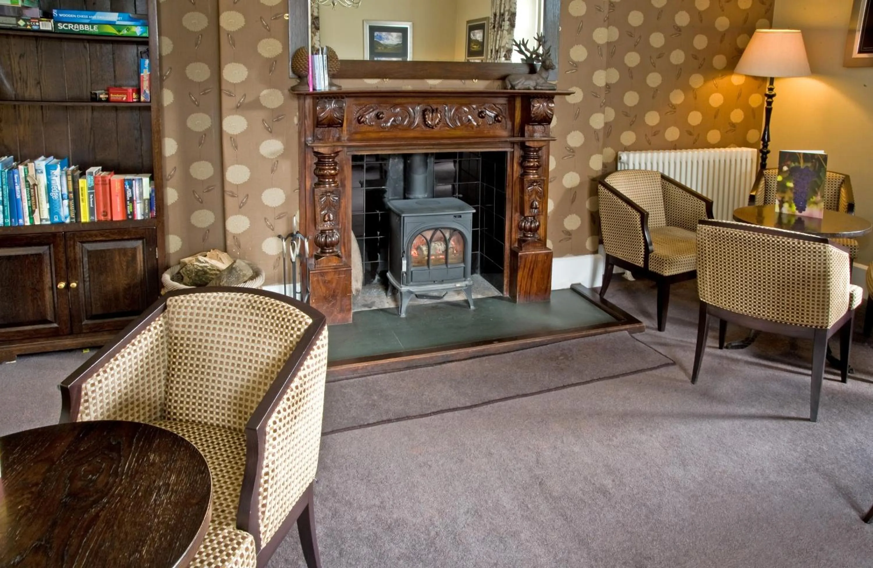 Communal lounge/ TV room in New Dungeon Ghyll Hotel