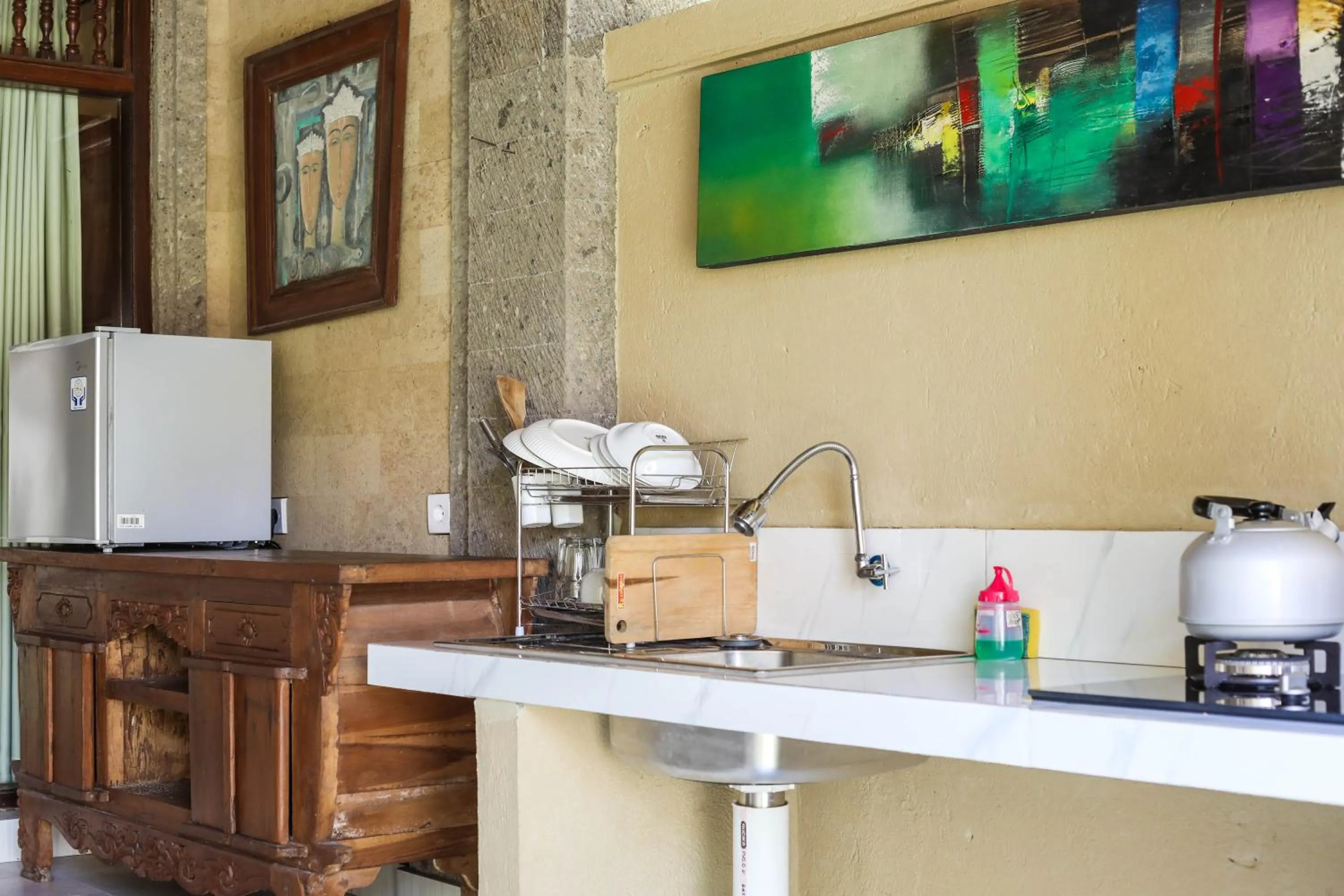 kitchen in Sari Bamboo Bungalows