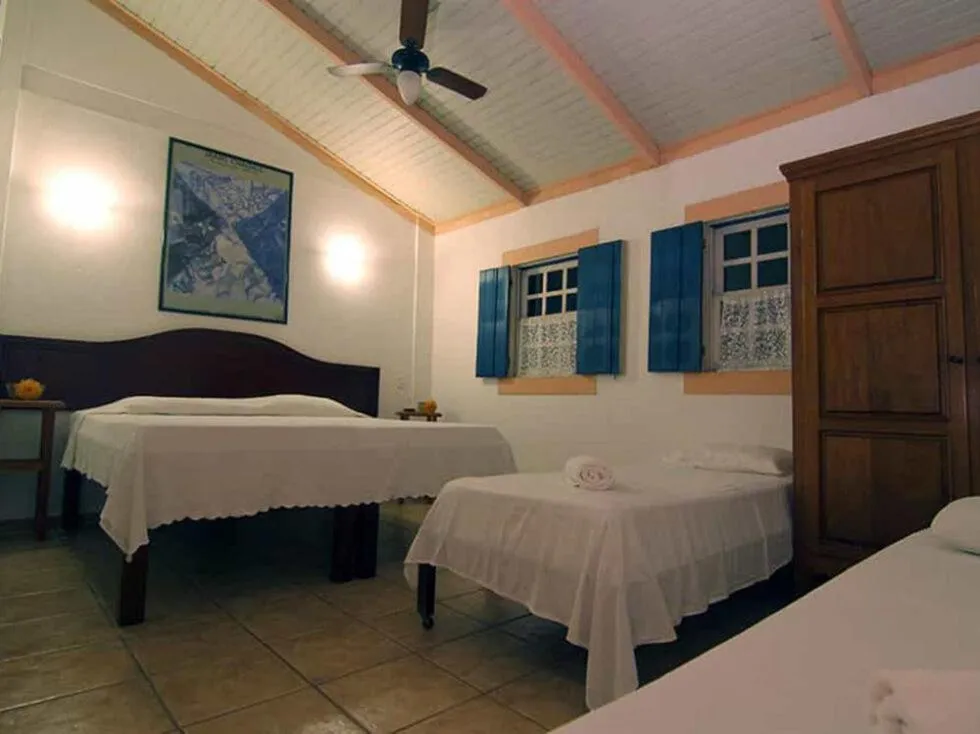 Photo of the whole room, Bed in Pousada Pouso do Sô Vigario
