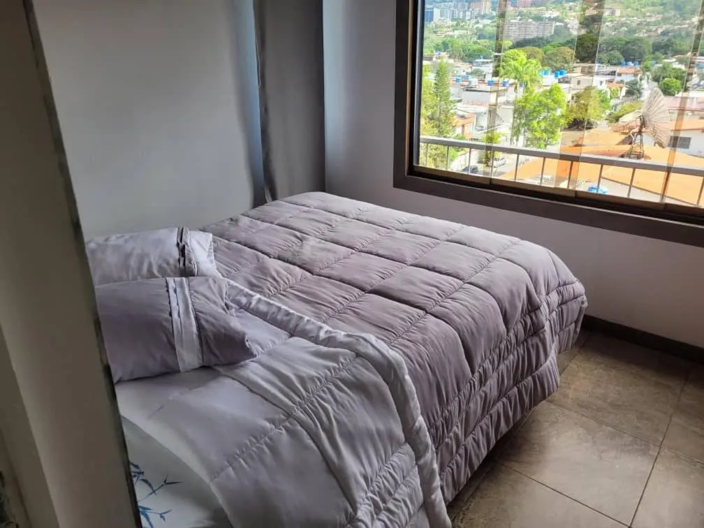 Bed in Apartamento tipo estudio