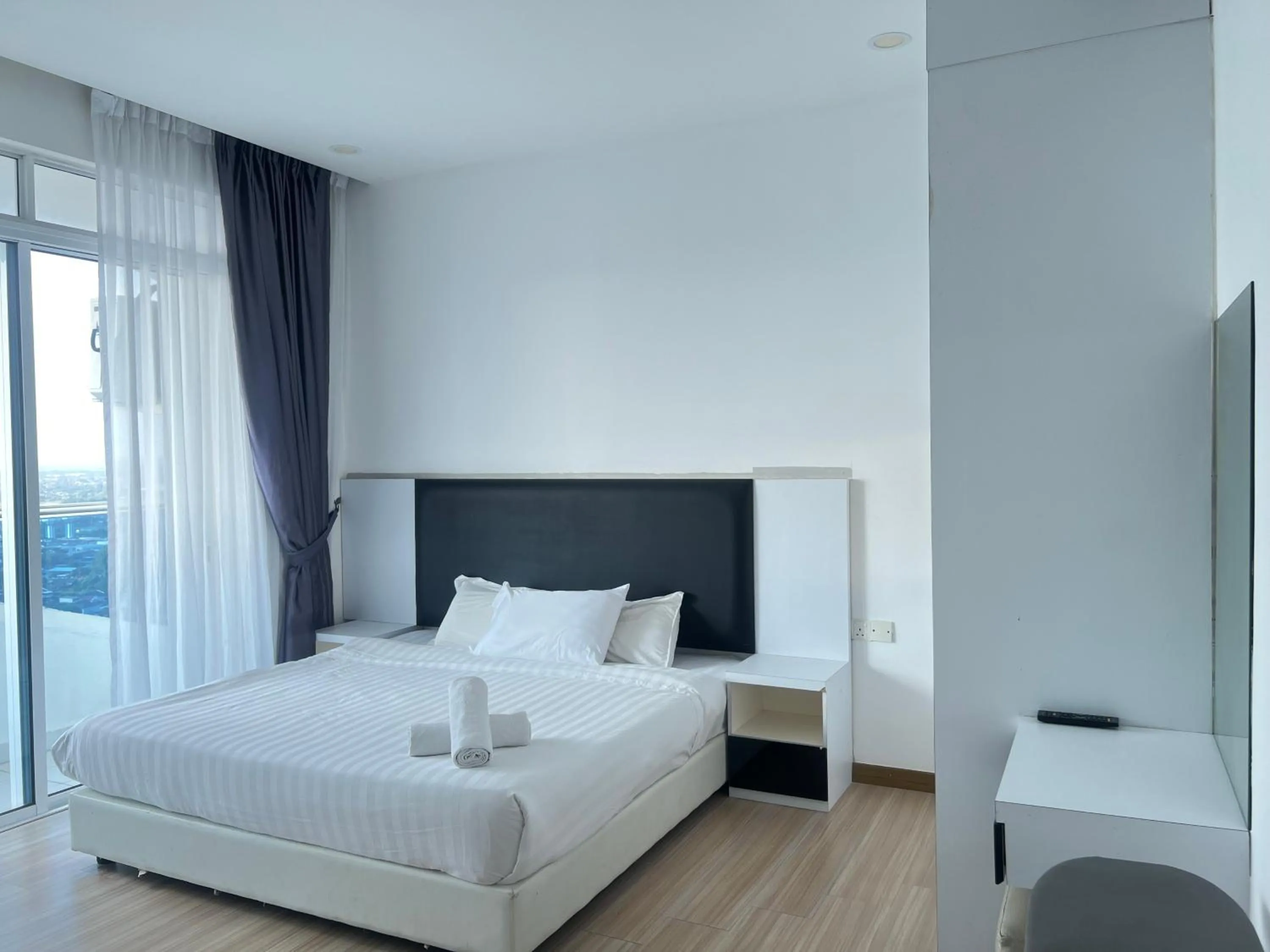 Bed in ExcluSuites Malacca @ The Wave Residence