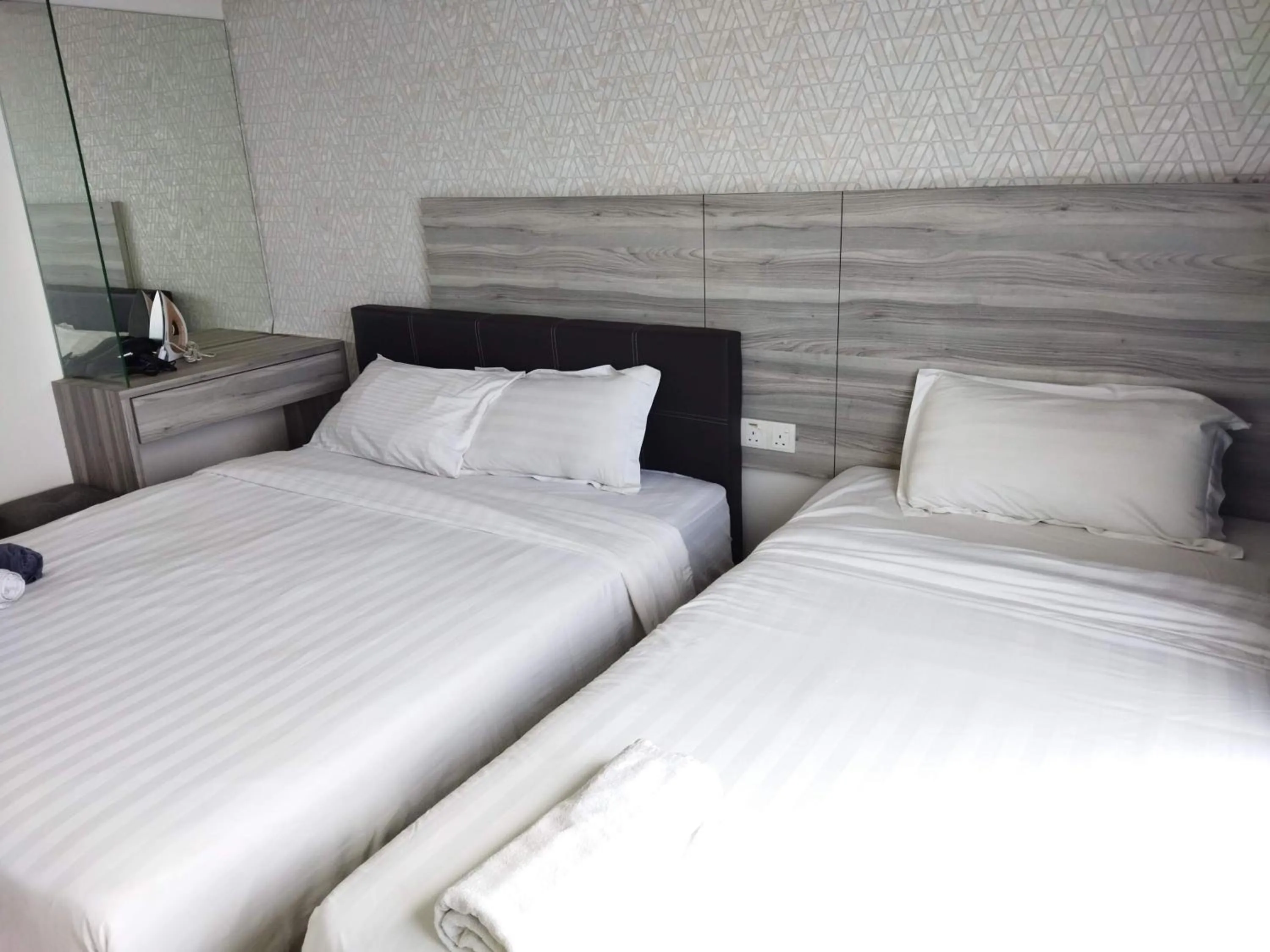 Bed in ExcluSuites Malacca @ The Wave Residence