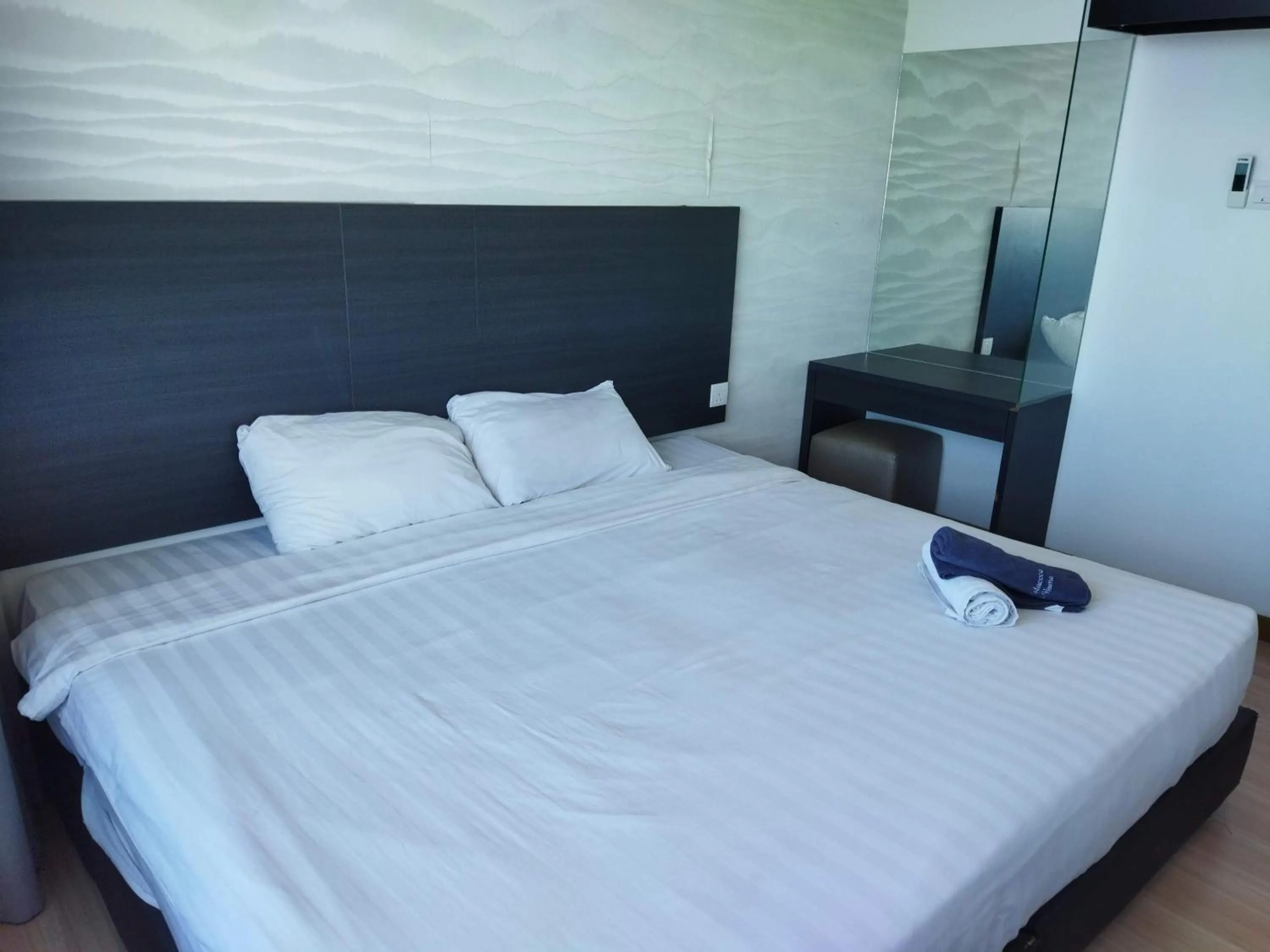 Bed in ExcluSuites Malacca @ The Wave Residence
