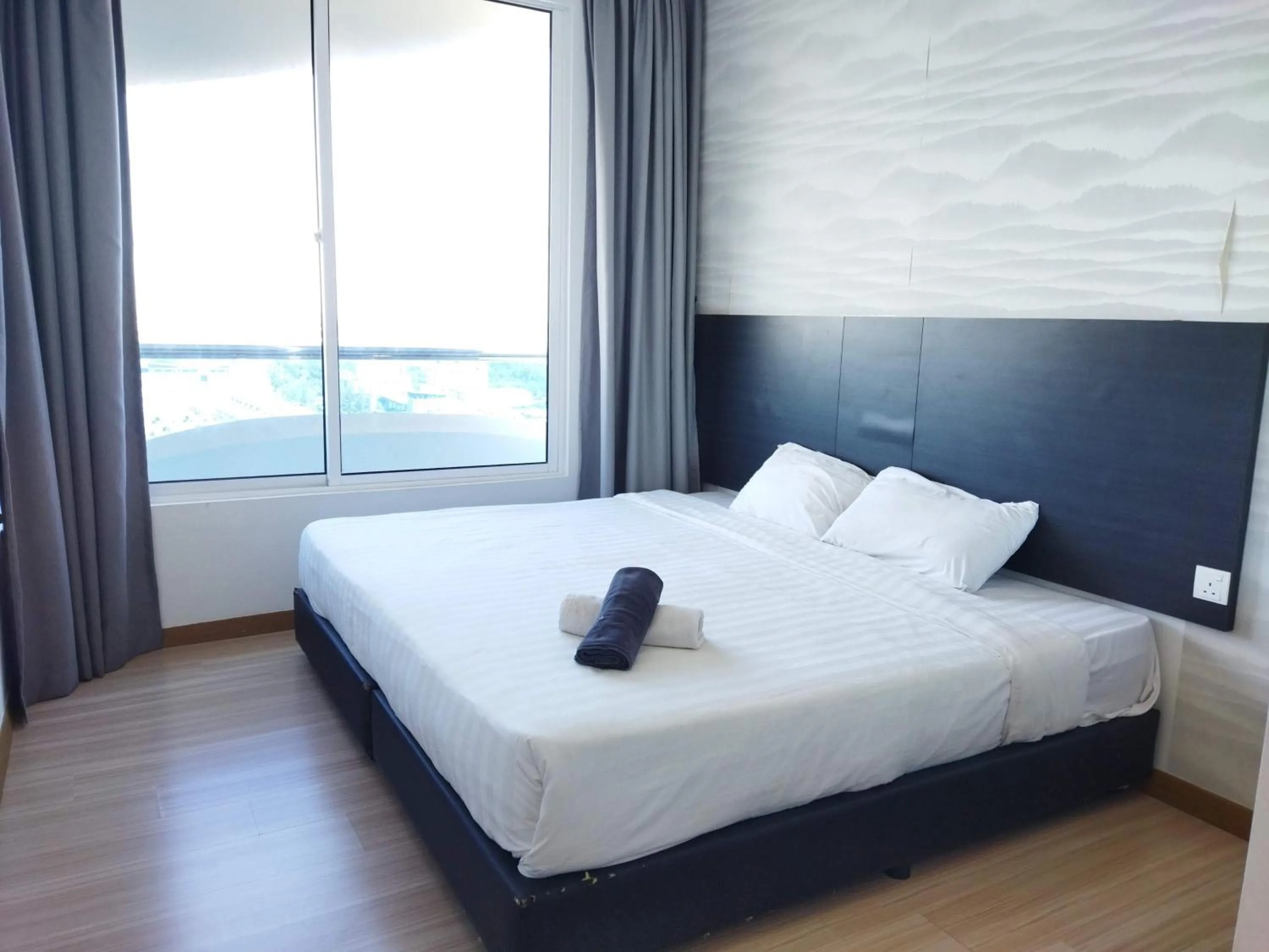 Bed in ExcluSuites Malacca @ The Wave Residence