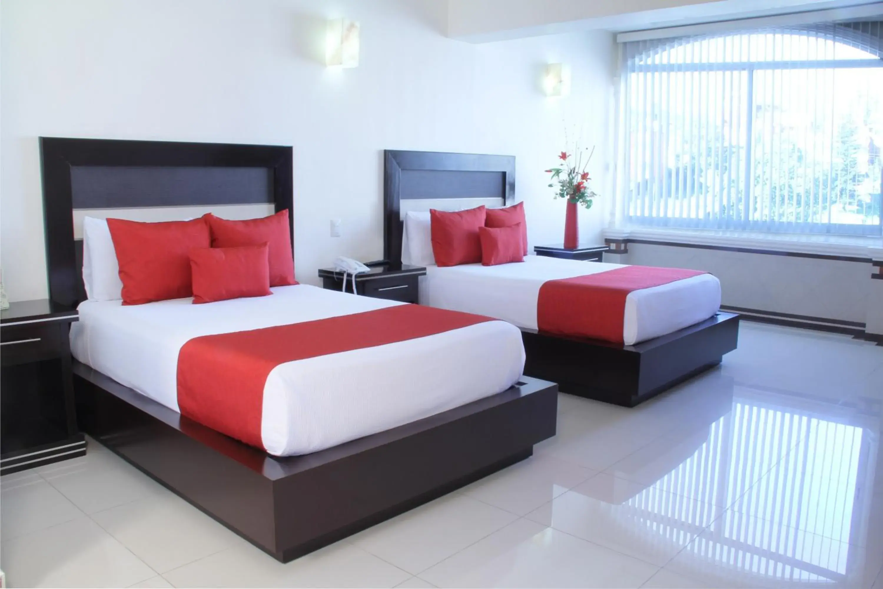 Bed in Villa Las Margaritas Caxa Bed in Villa Las Margaritas Caxa