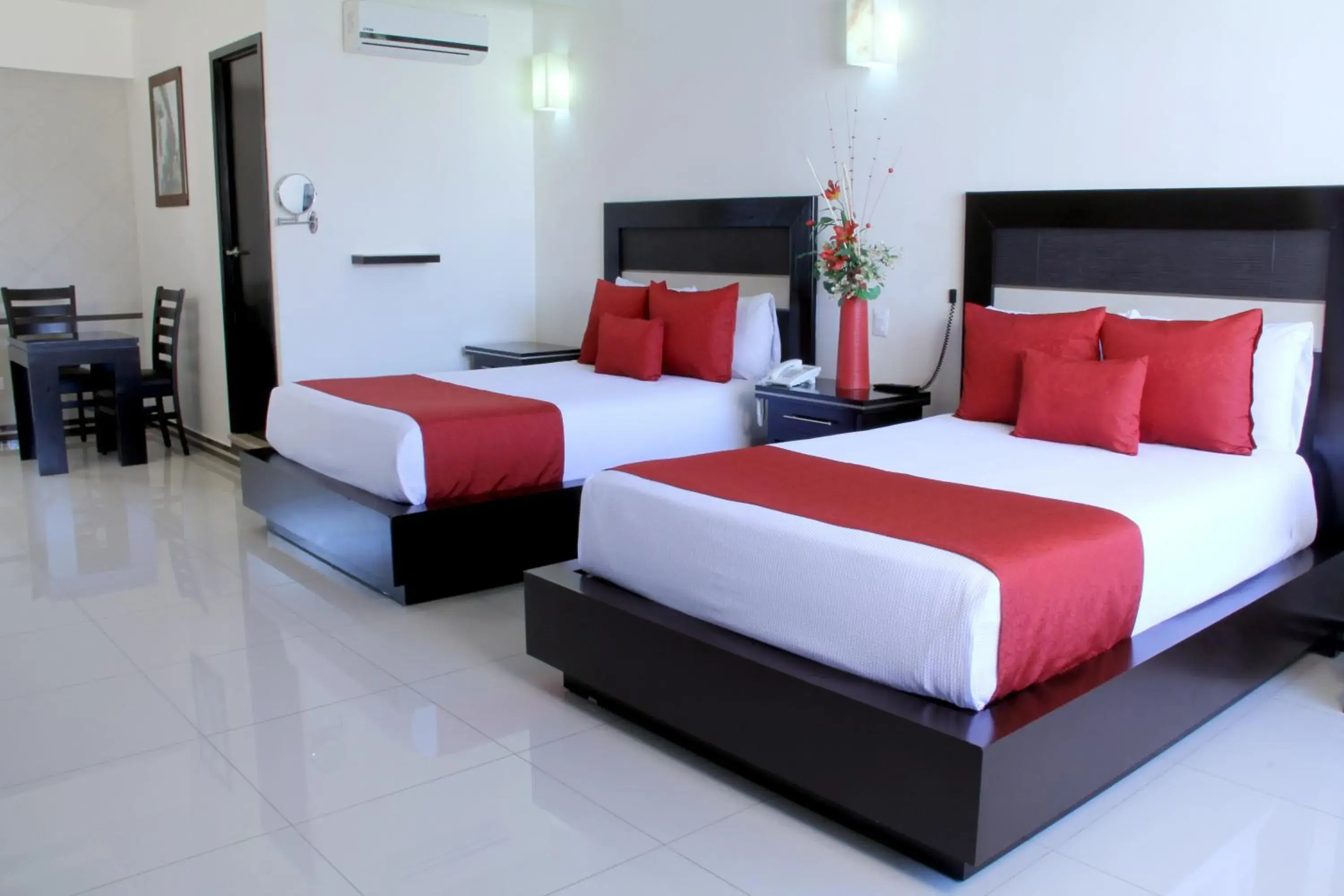 Bed in Villa Las Margaritas Caxa Bed in Villa Las Margaritas Caxa