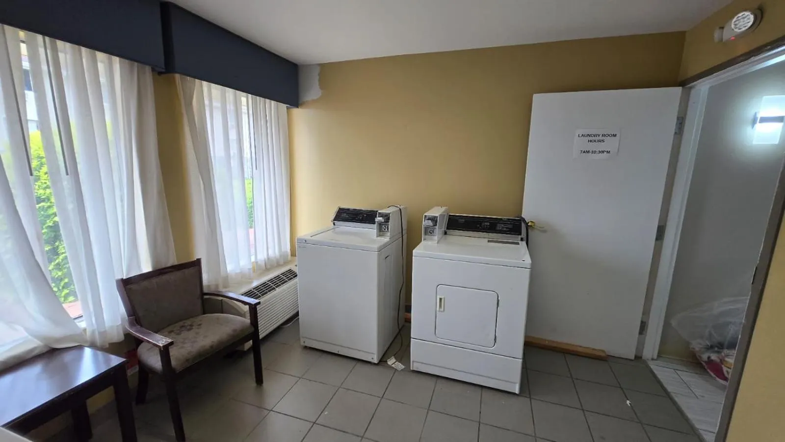 laundry in Copley Inn & Suites By OYO Akron OH