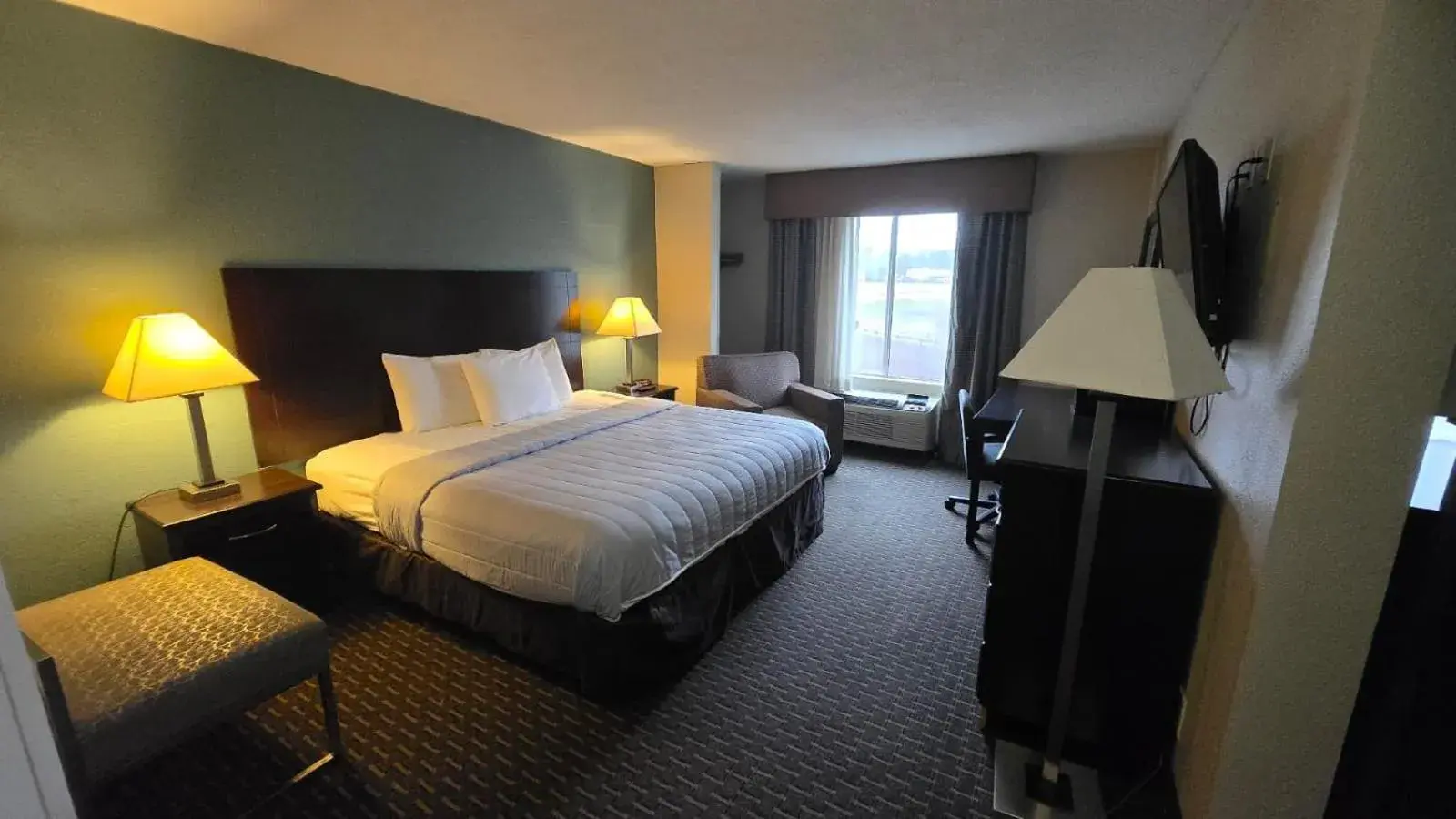 Bedroom, Bed in Copley Inn & Suites By OYO Akron OH Bedroom, Bed in Copley Inn & Suites By OYO Akron OH