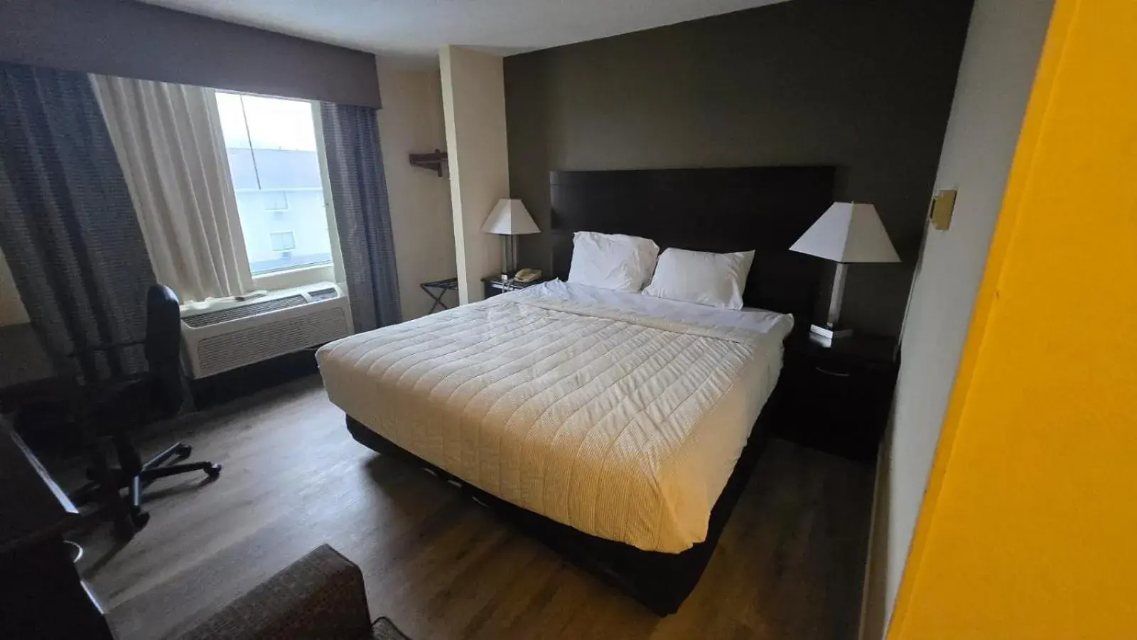 Bedroom, Bed in Copley Inn & Suites By OYO Akron OH Bedroom, Bed in Copley Inn & Suites By OYO Akron OH