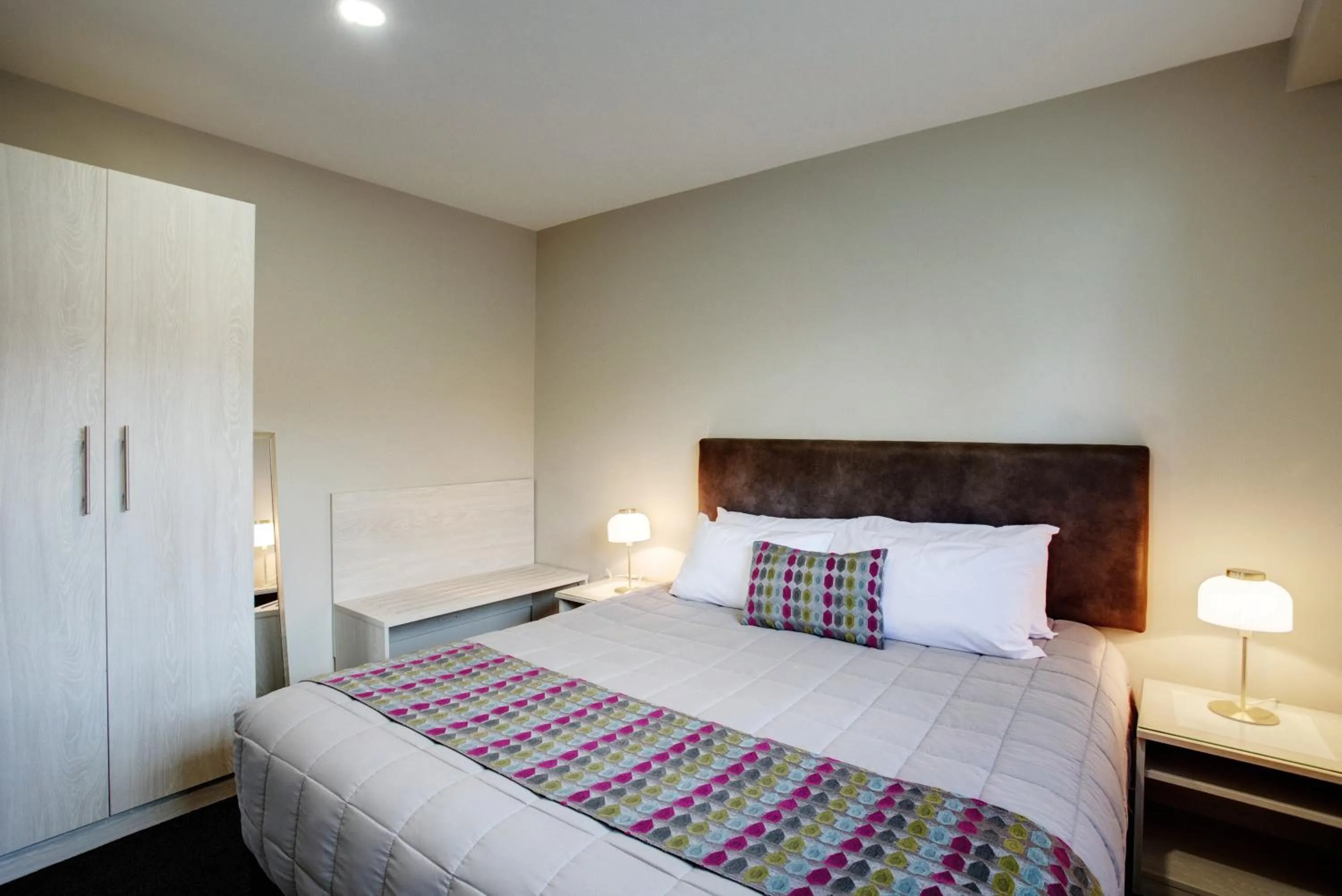 Bed in Ellerslie Palms Motel