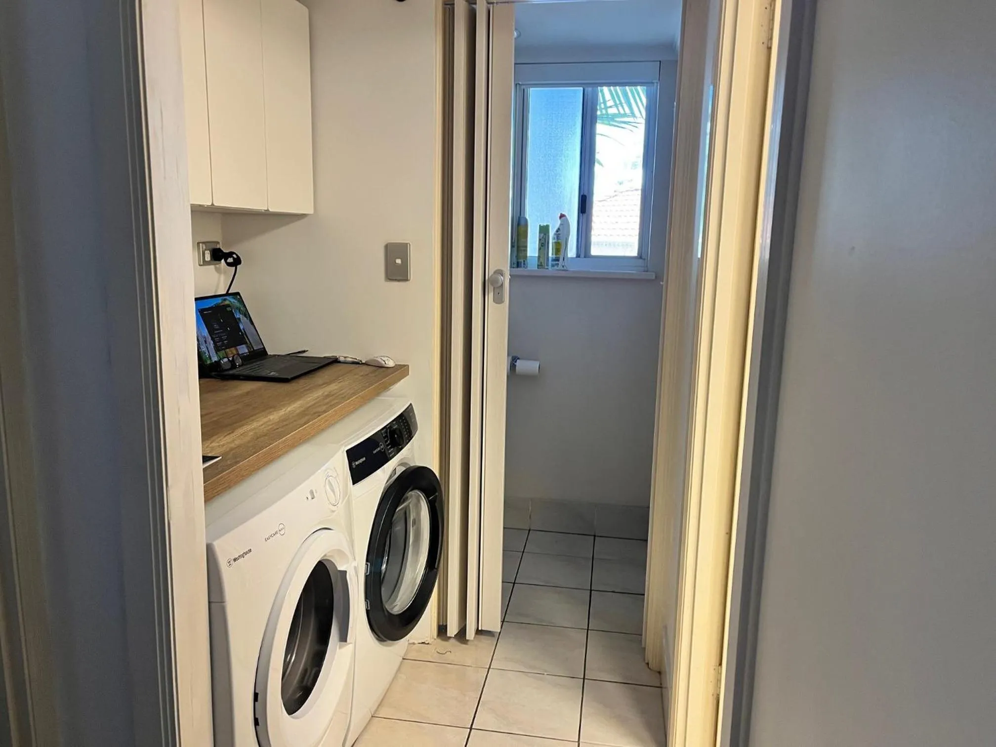 washing machine in The Burlington Holiday Apartments