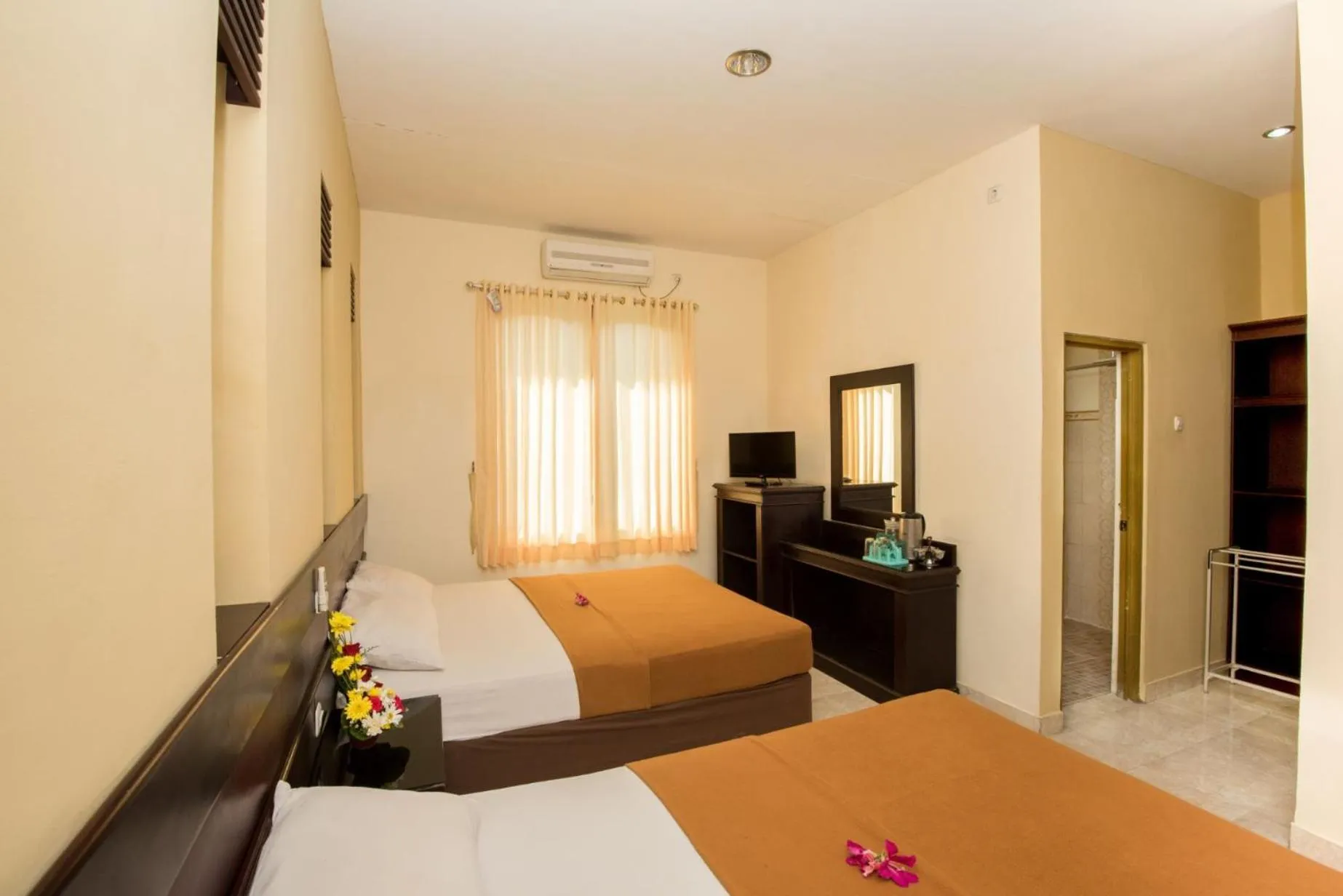 Bed in Hotel Puri Nusa Indah