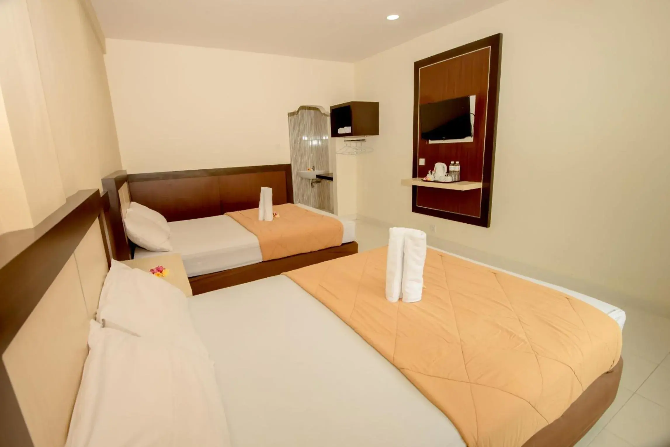 Bed in Hotel Puri Nusa Indah Bed in Hotel Puri Nusa Indah