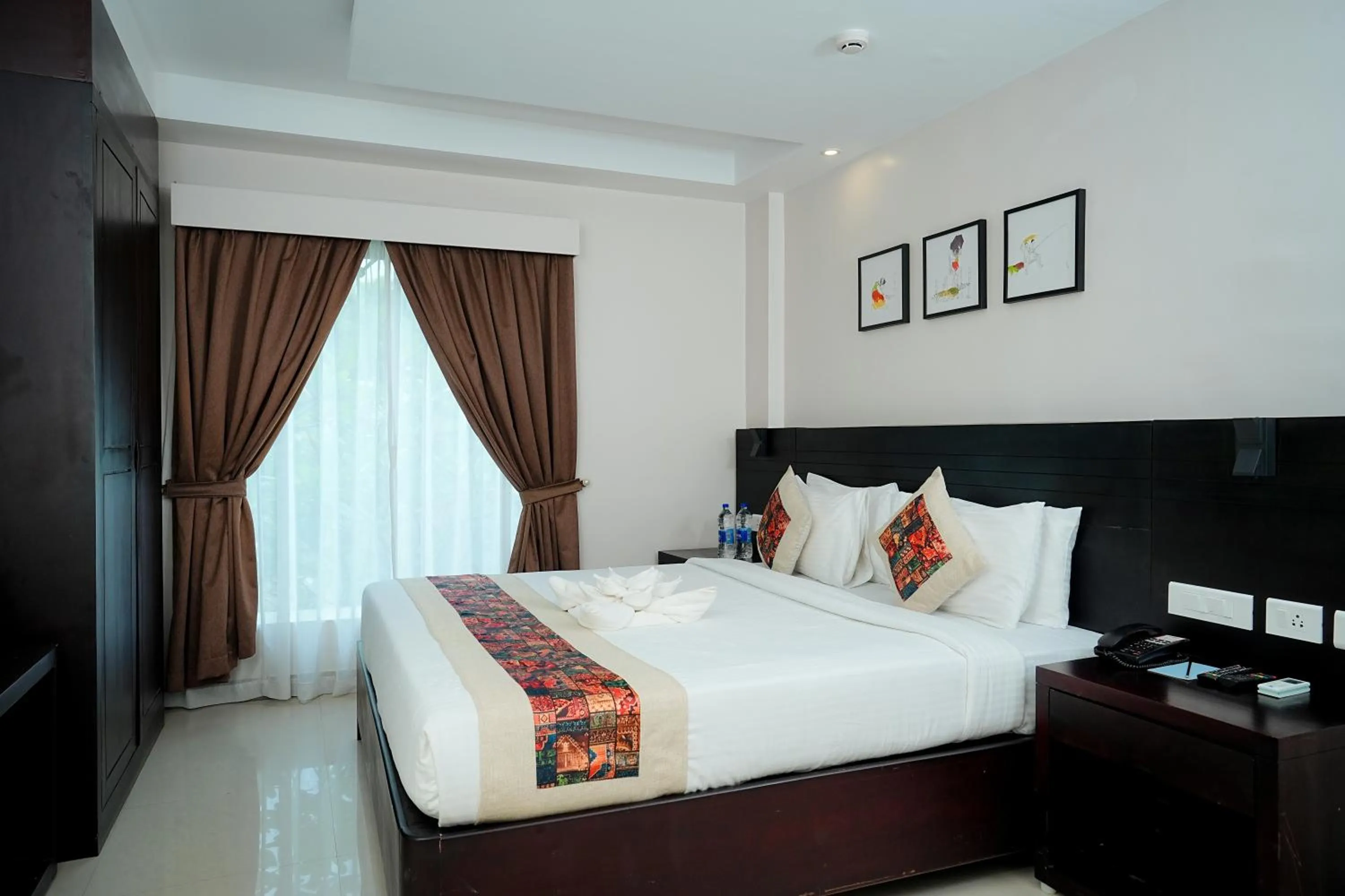 Bed in D Fort Hotel Kollam