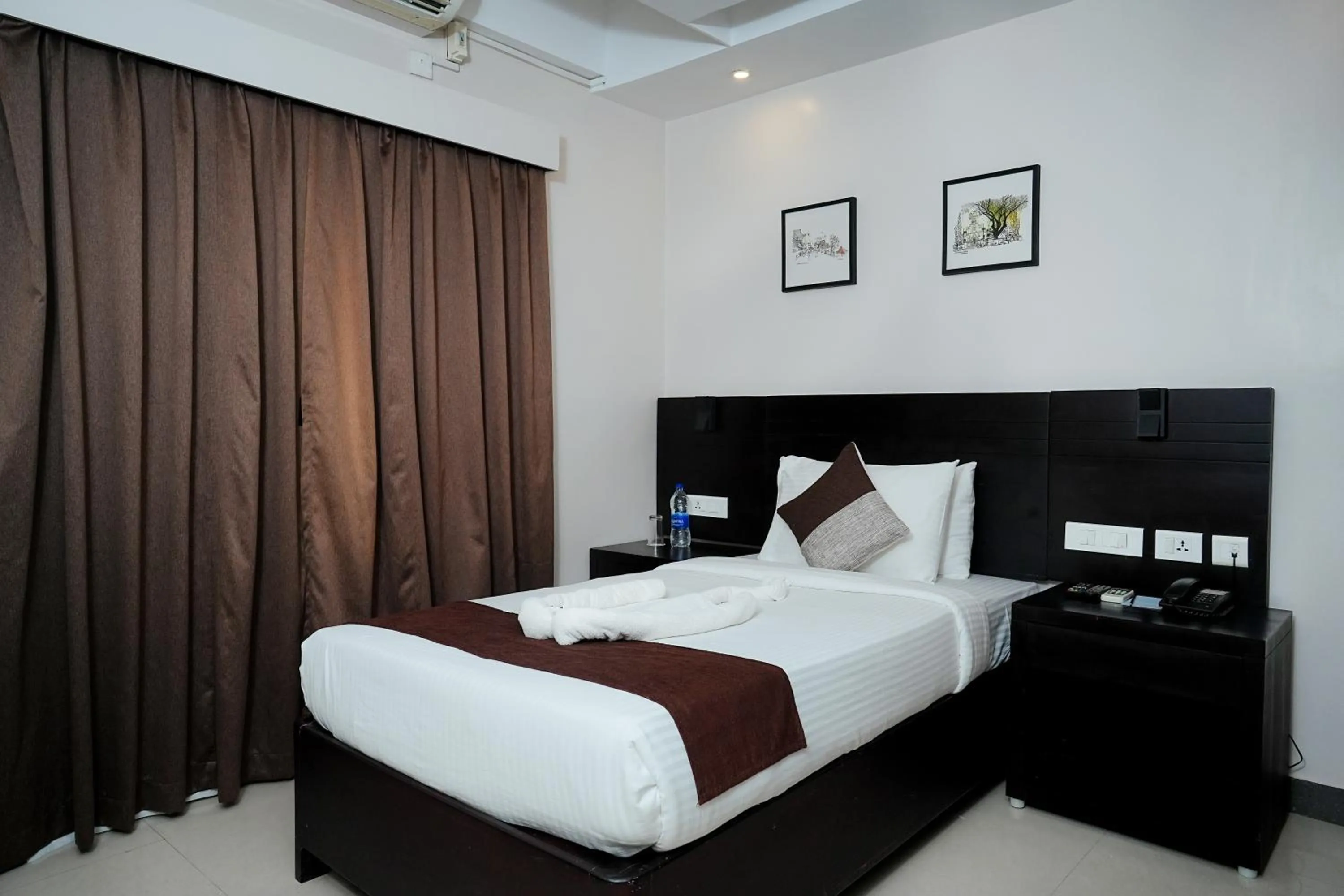 Bed in D Fort Hotel Kollam