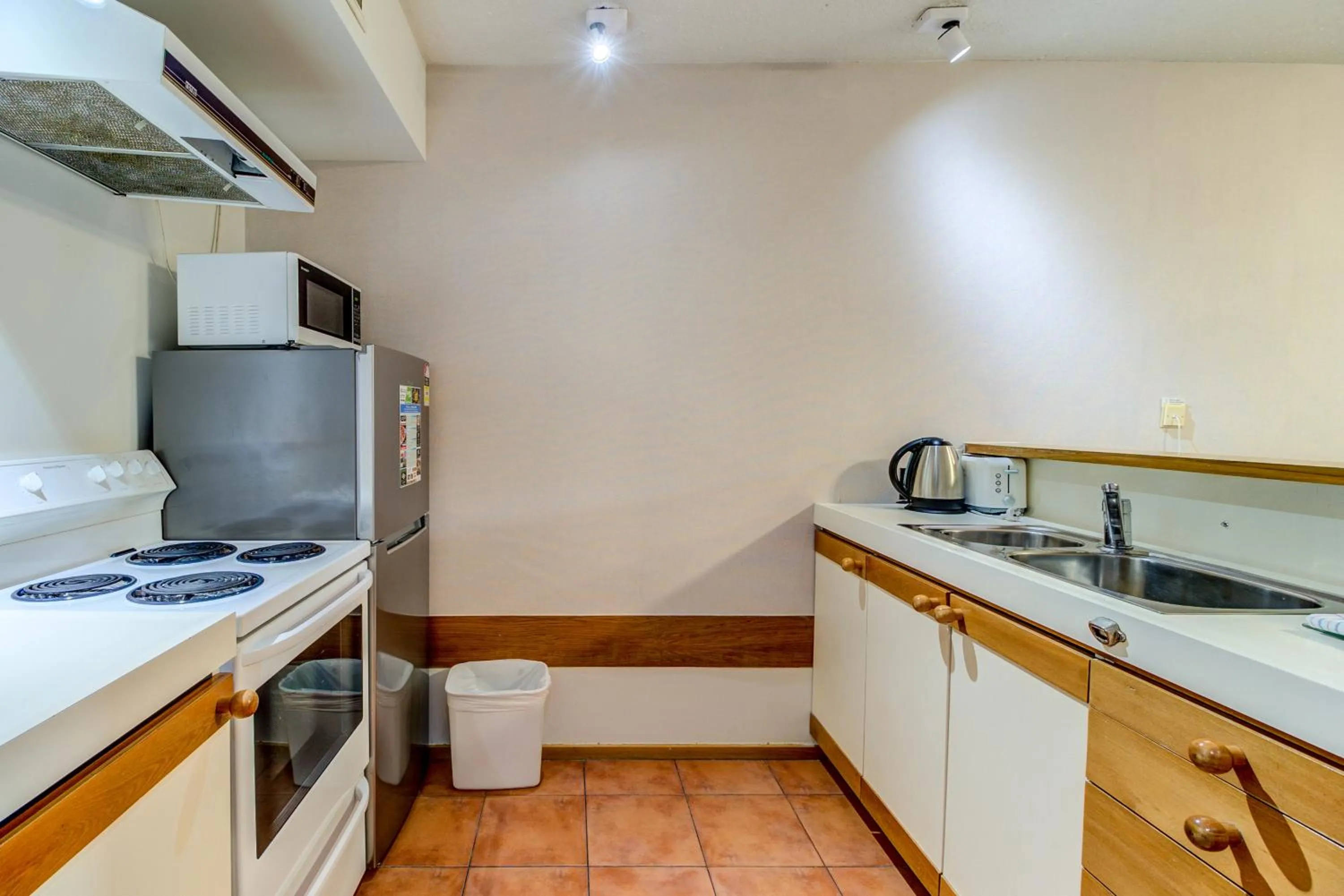 Kitchen or kitchenette in The Lofts Apartments