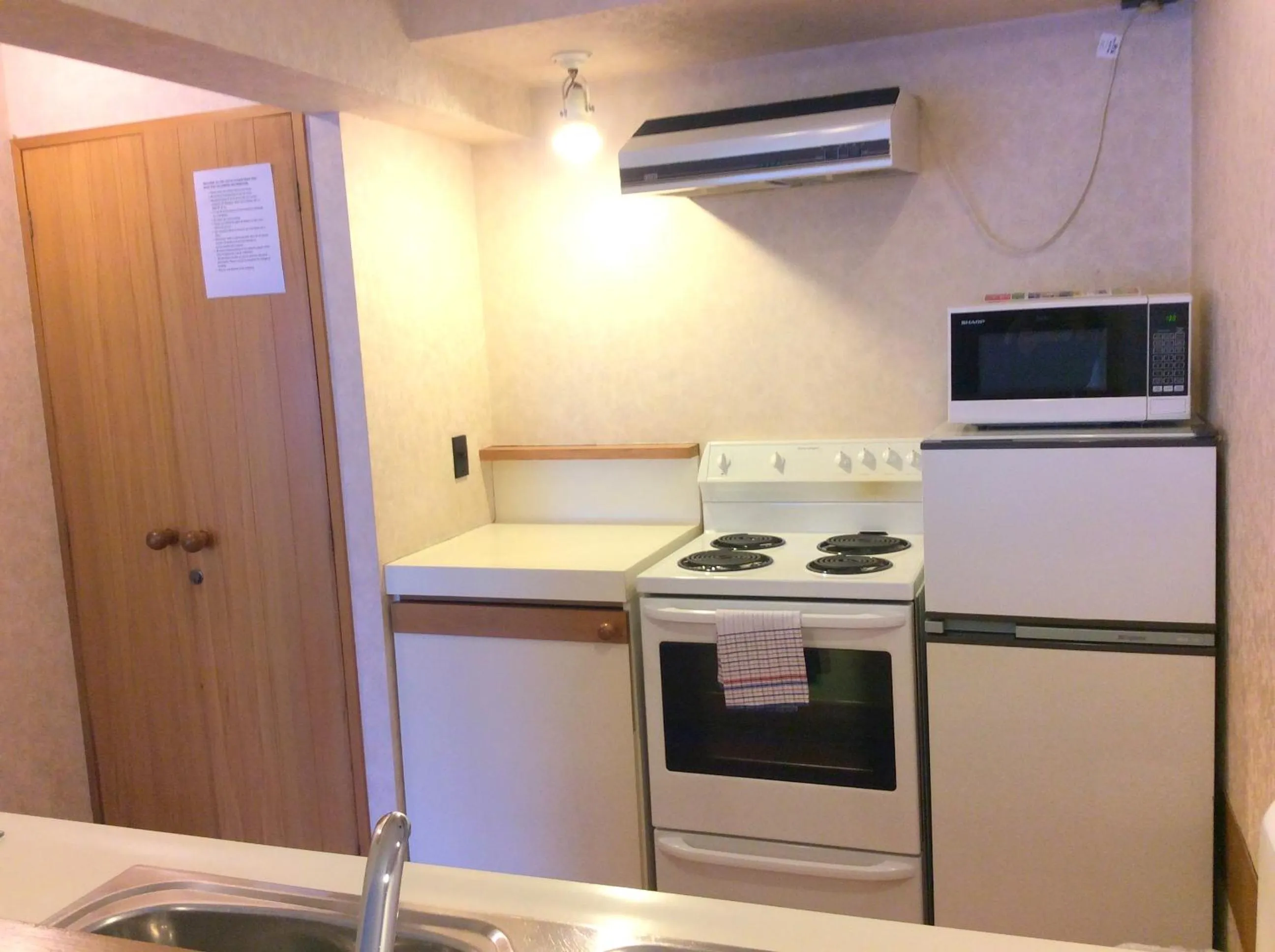 Kitchen or kitchenette in The Lofts Apartments