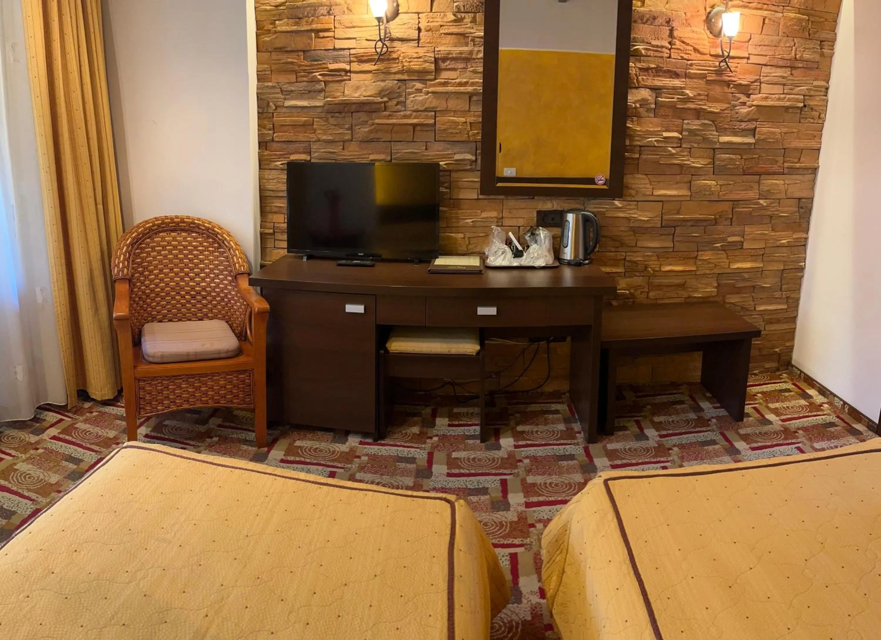 Bed in Casa Iris-Hotel & Restaurant