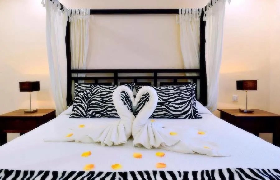 Bedroom, Bed in Evita Beach Suites Exclusivas