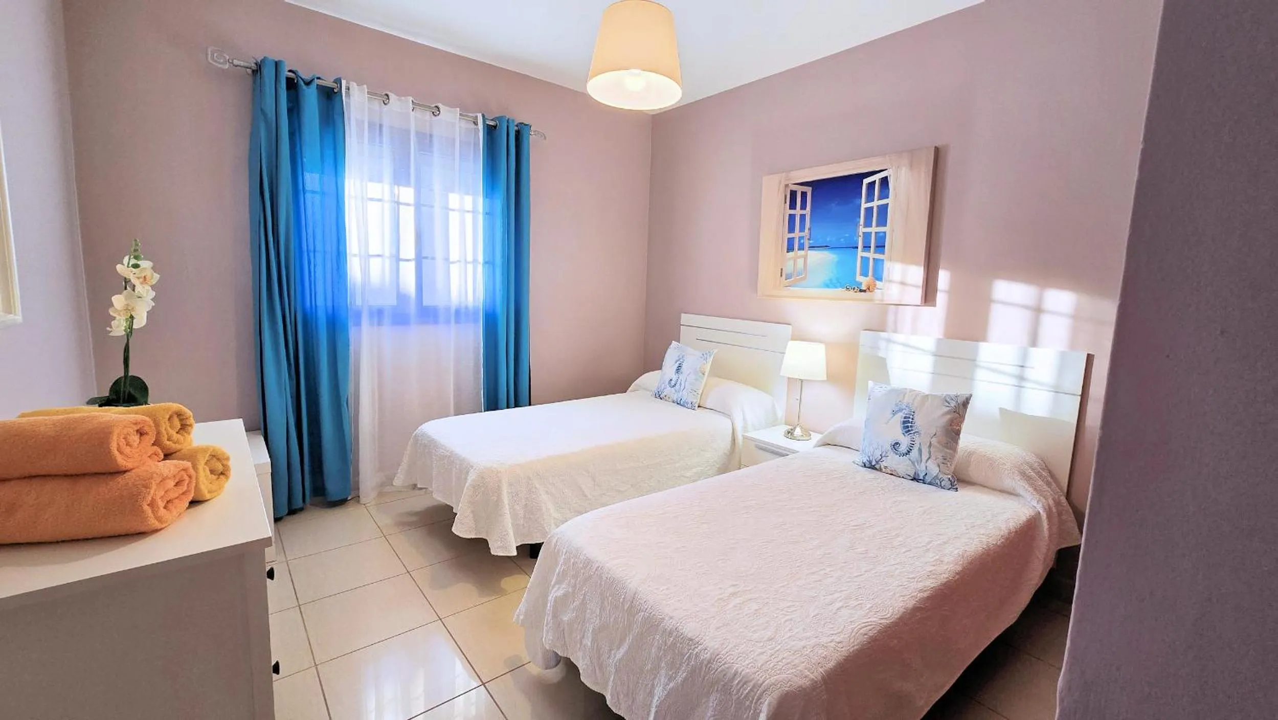 Bed in Evita Beach Suites Exclusivas