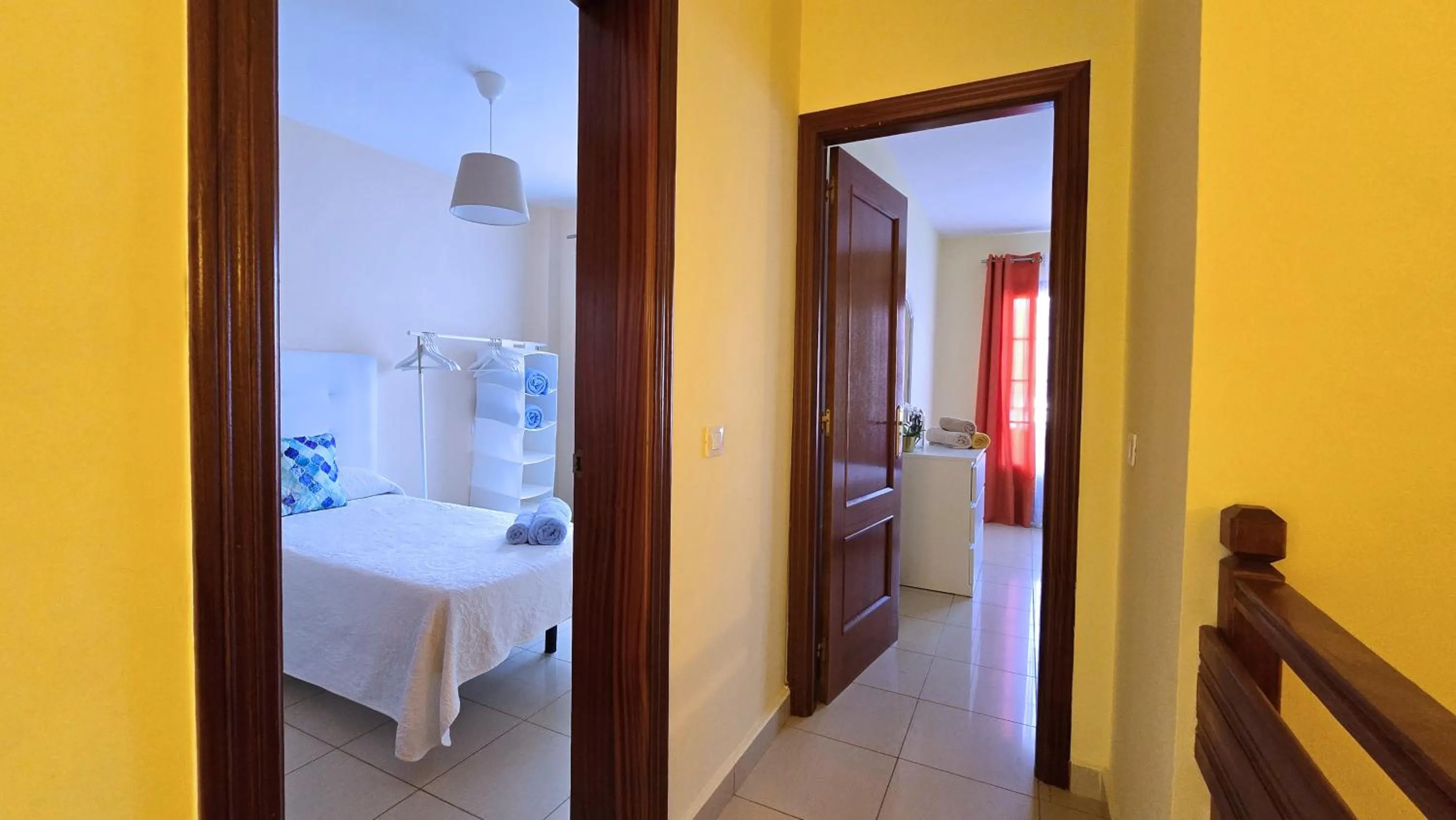 Bed in Evita Beach Suites Exclusivas