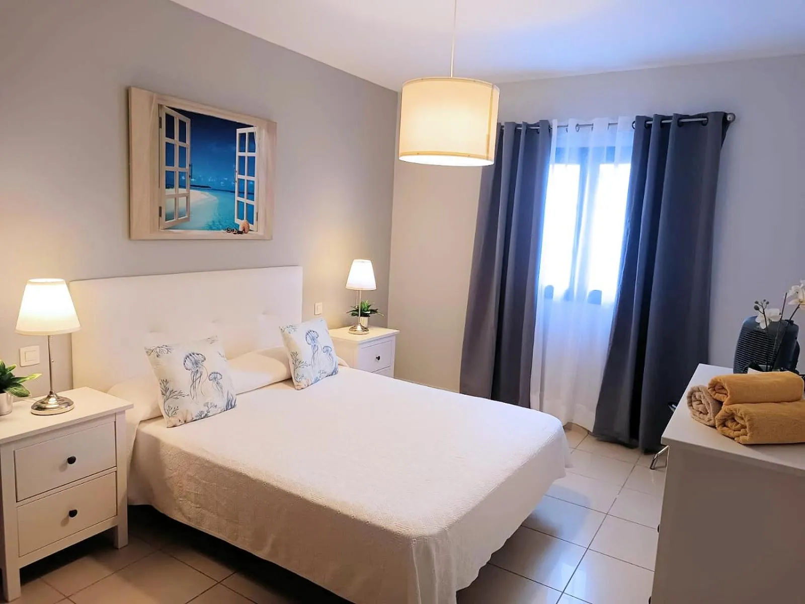 Bed in Evita Beach Suites Exclusivas