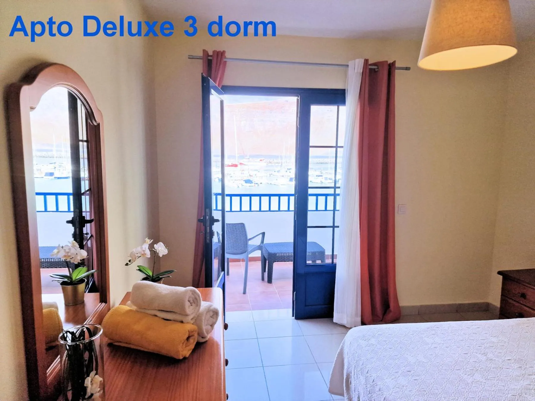 Bed in Evita Beach Suites Exclusivas