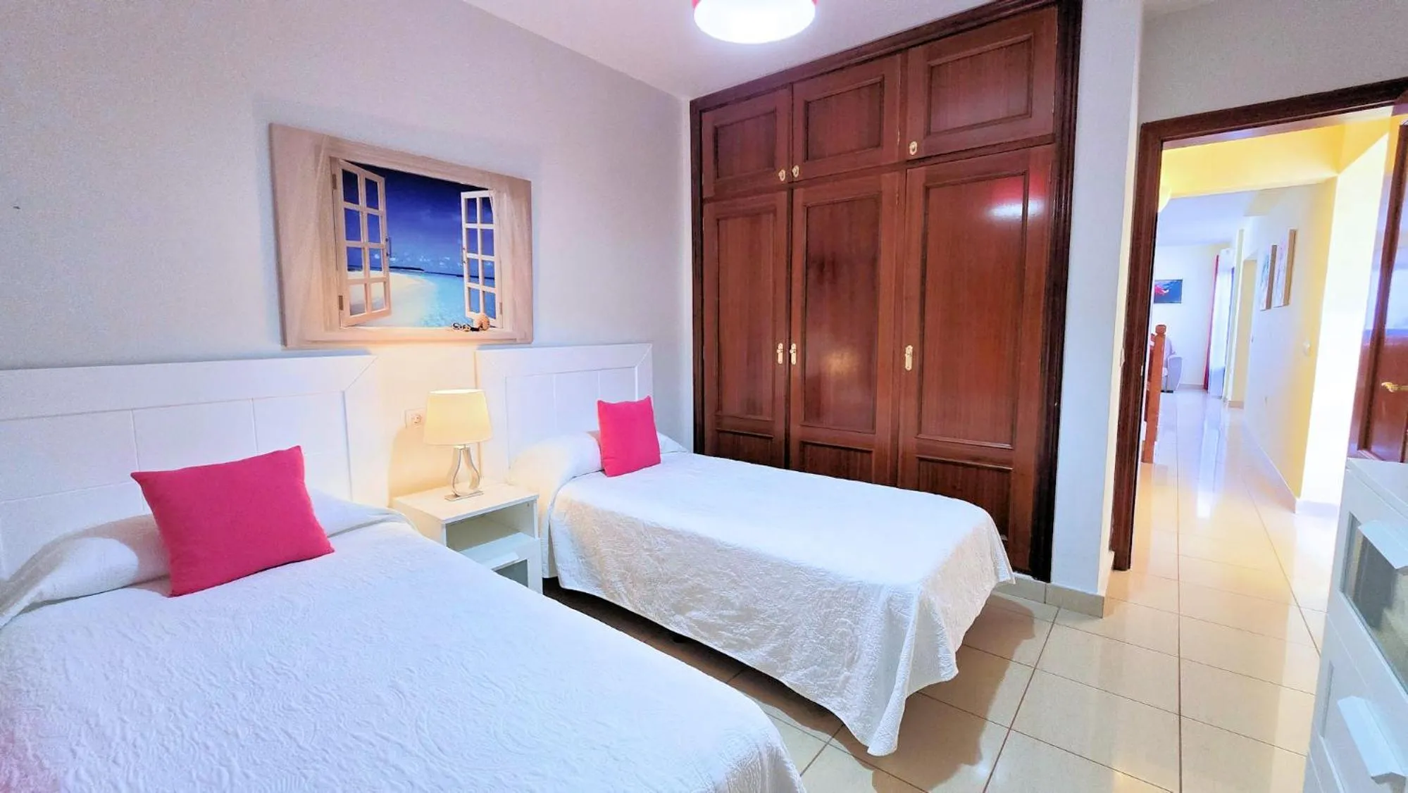 Bed in Evita Beach Suites Exclusivas