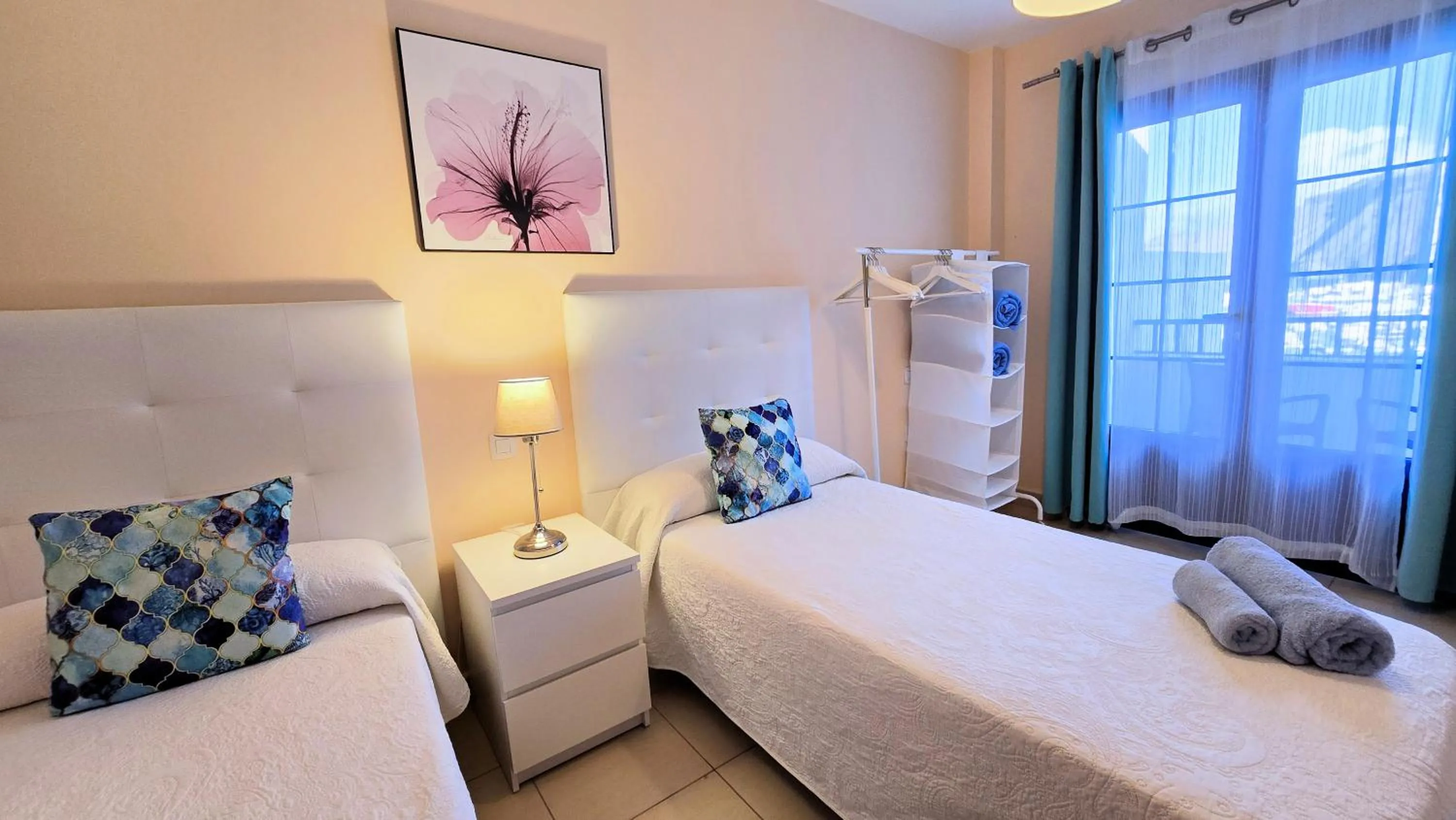 Bed in Evita Beach Suites Exclusivas