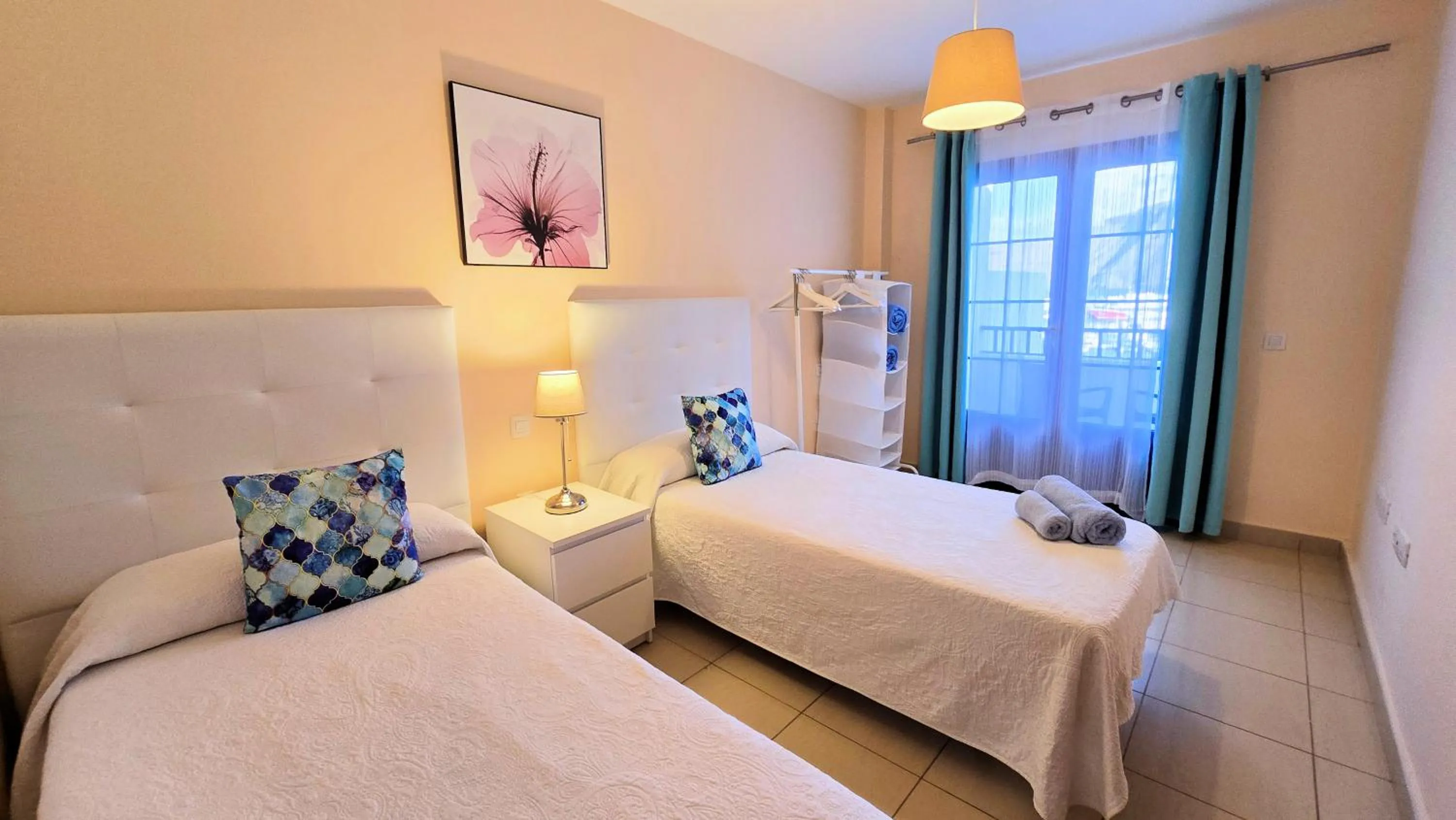 Bed in Evita Beach Suites Exclusivas