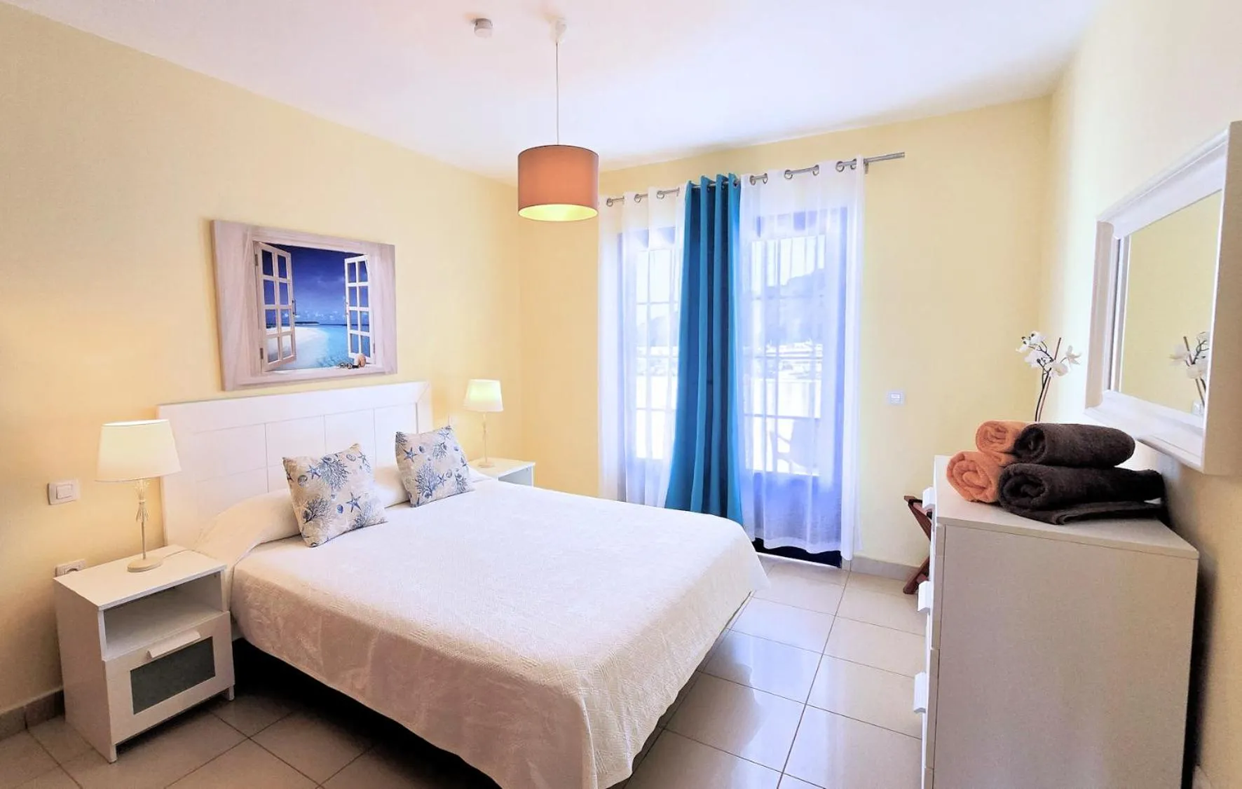 Bed in Evita Beach Suites Exclusivas