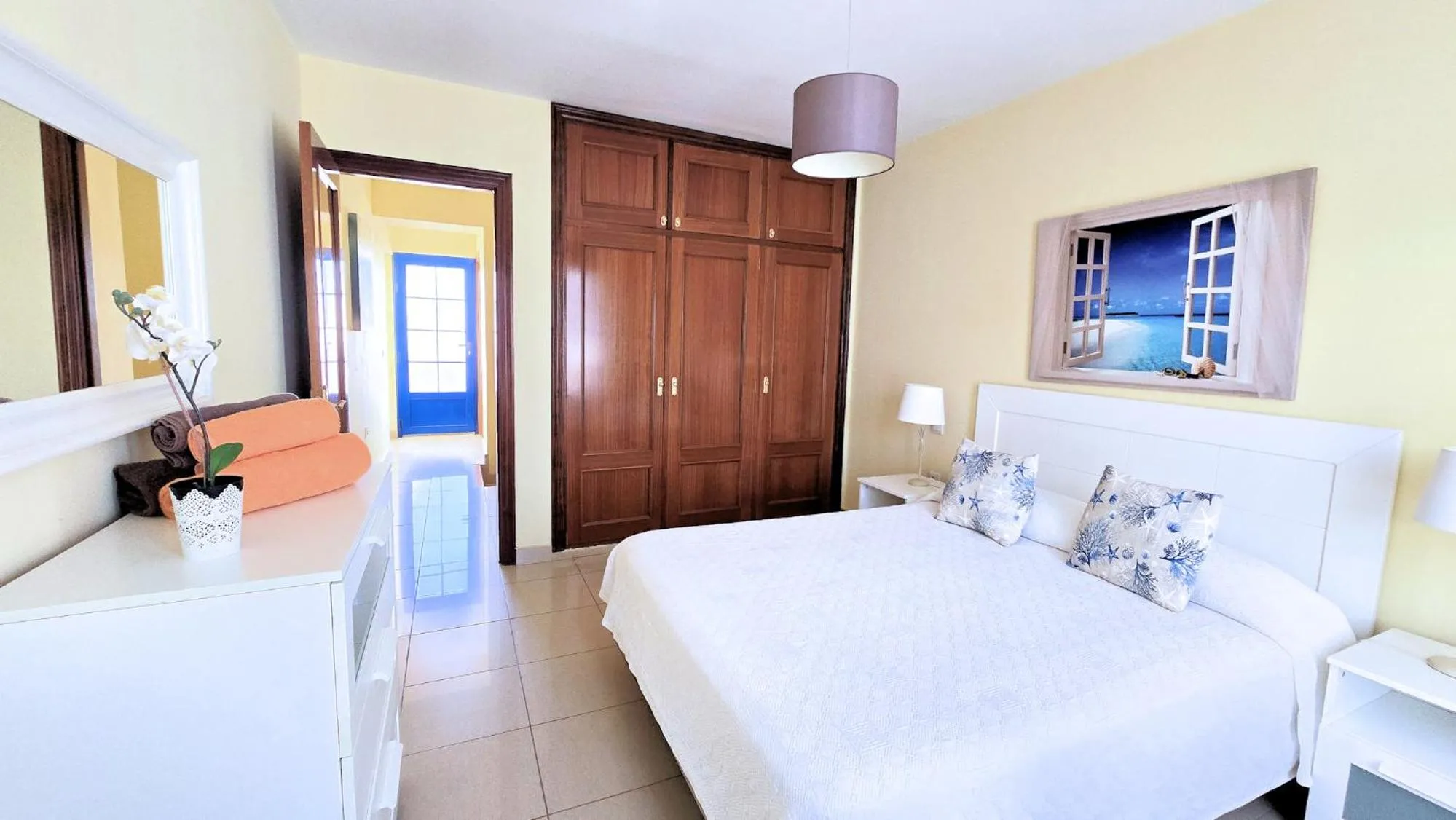 Bed in Evita Beach Suites Exclusivas