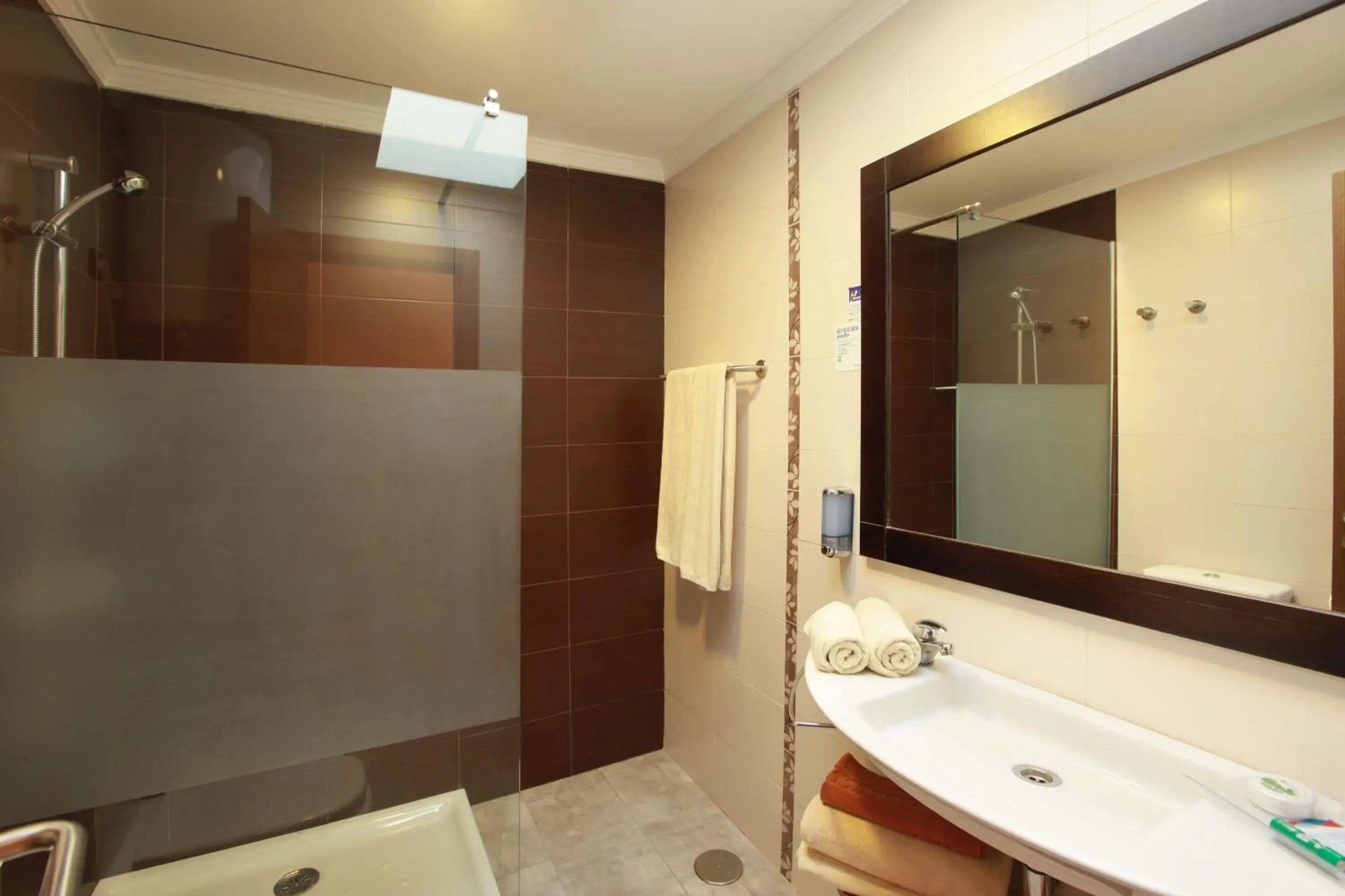 Bathroom in Grupotel Playa Feliz Bathroom in Grupotel Playa Feliz