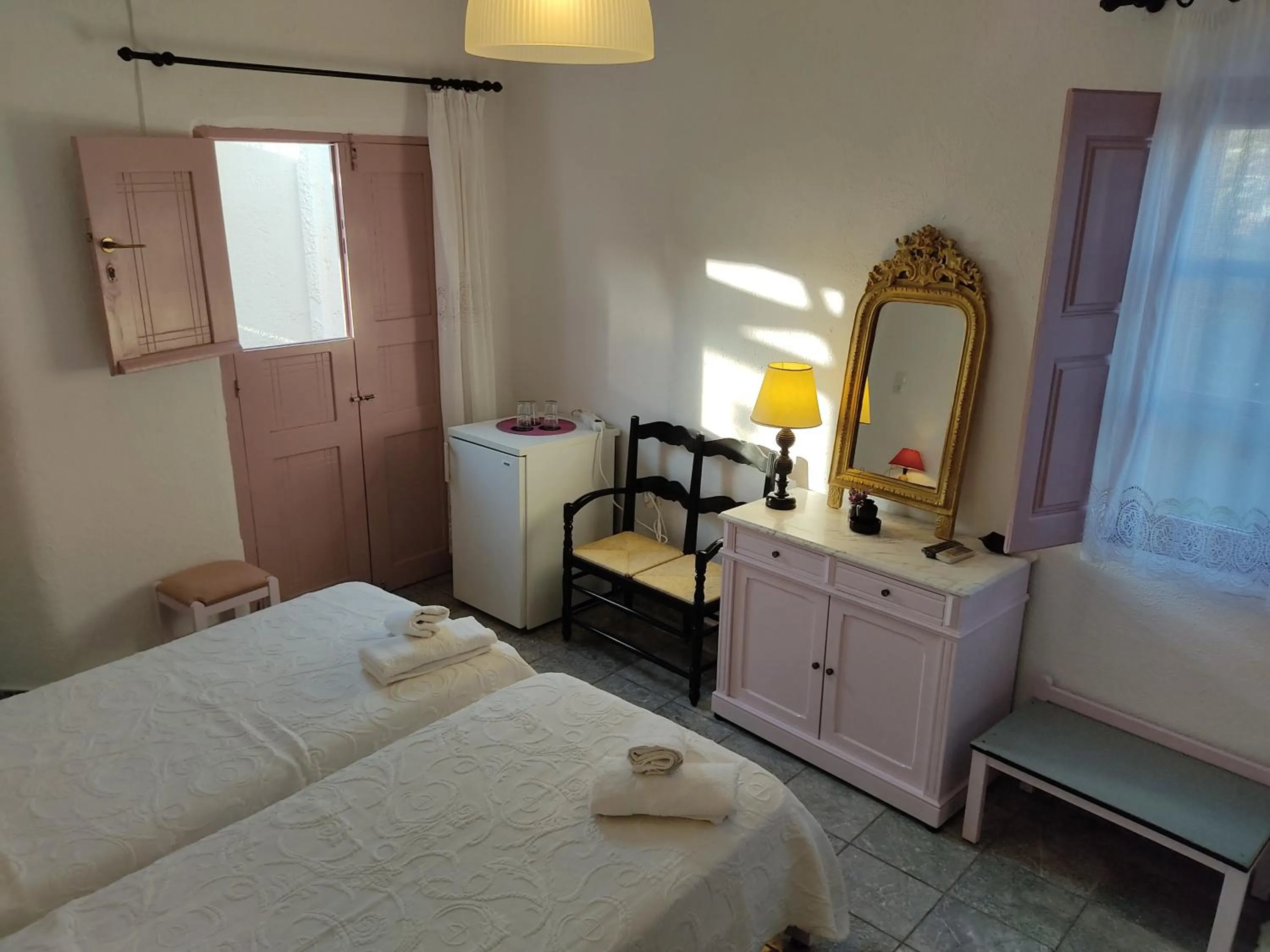 Bed in Porto Sikinos Hotel