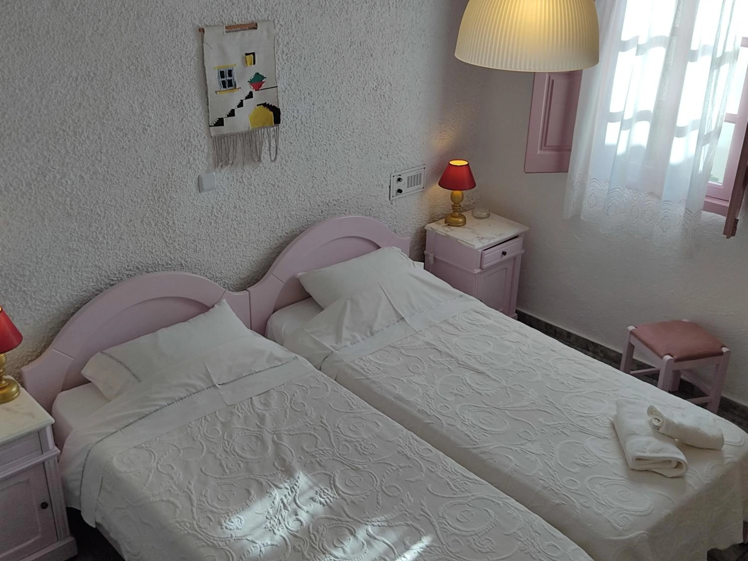 Bed in Porto Sikinos Hotel