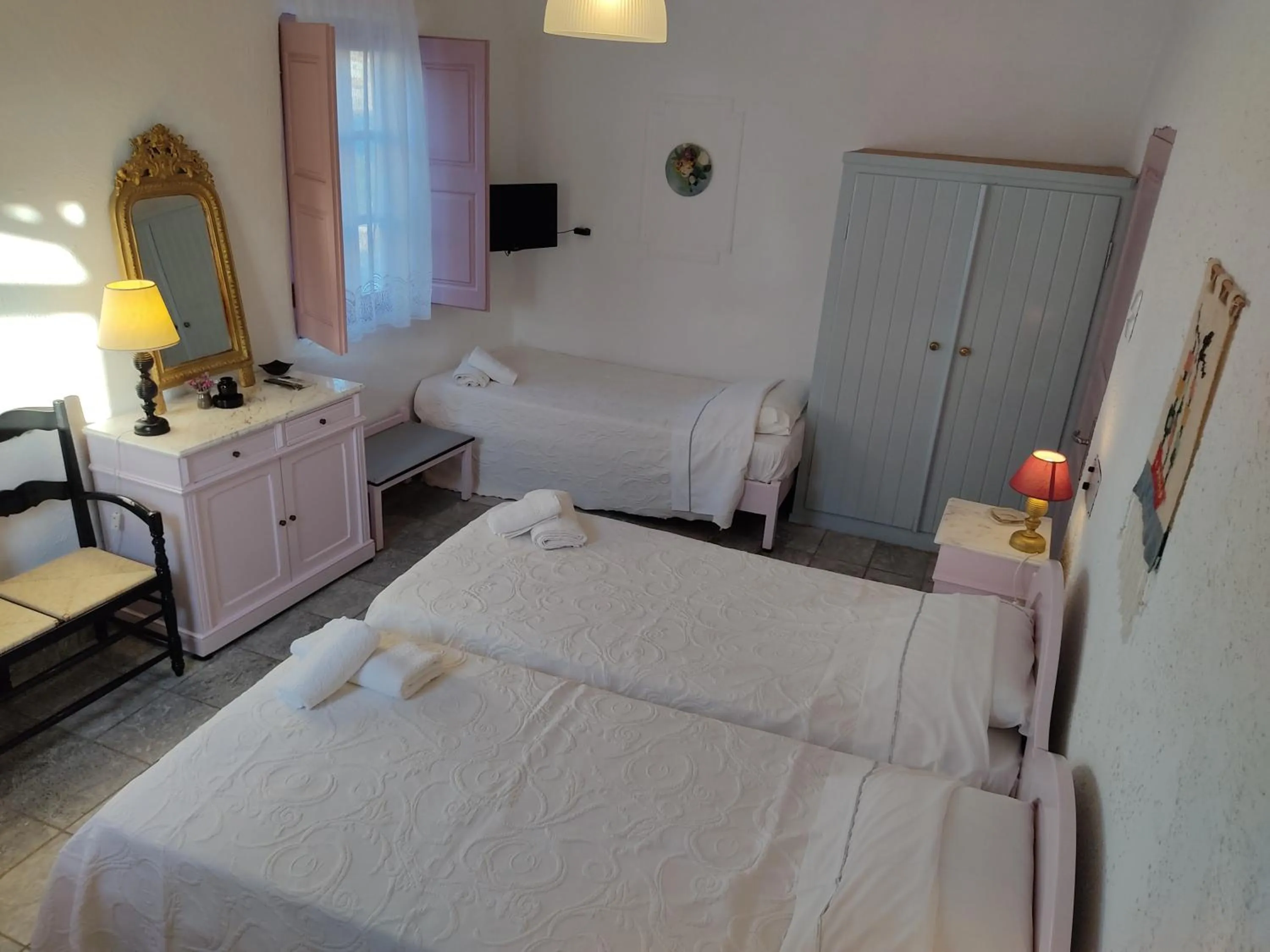 Bed in Porto Sikinos Hotel