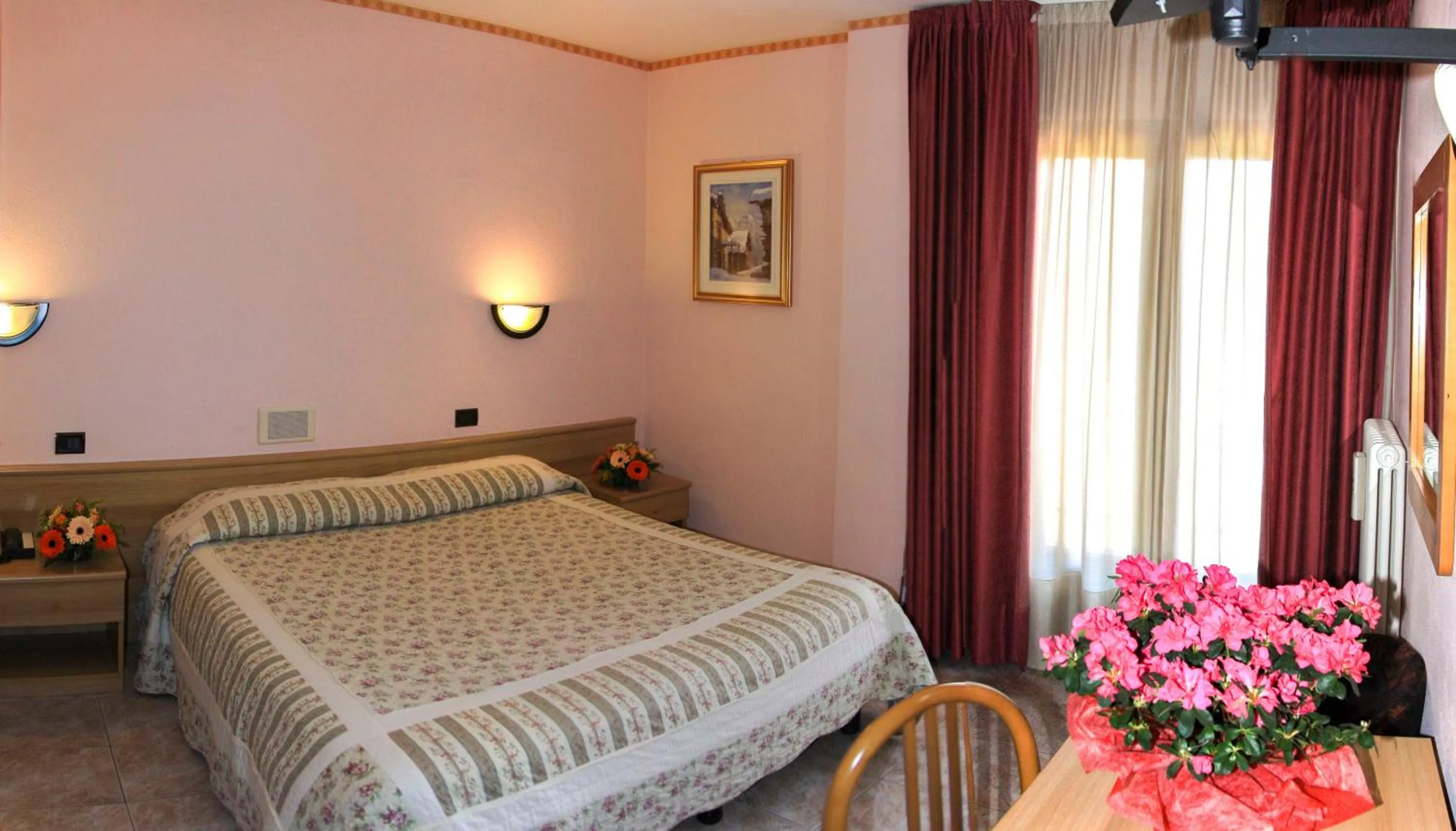 Bed in Hotel Les Saisons