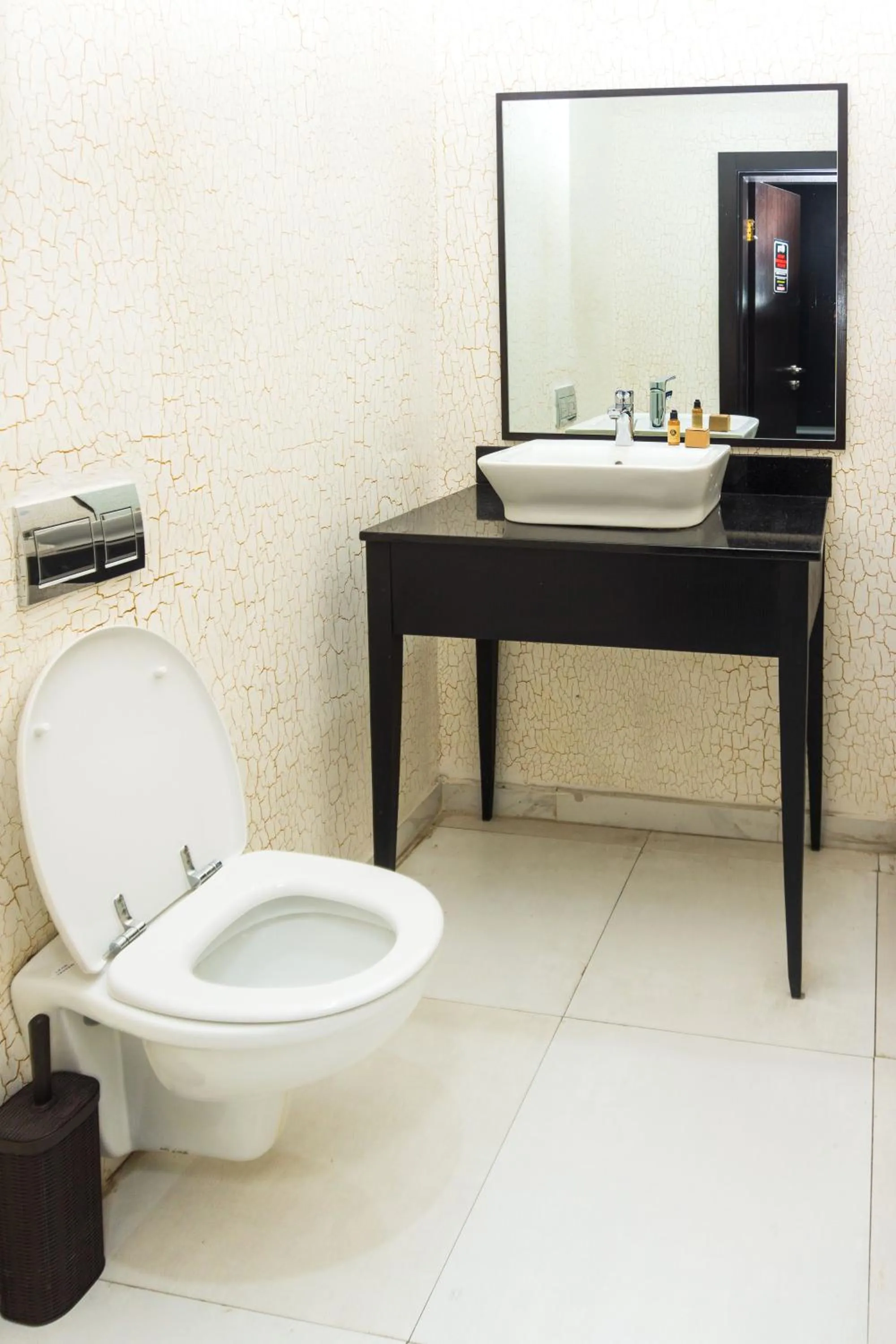 Toilet in GreenPoint Hotel