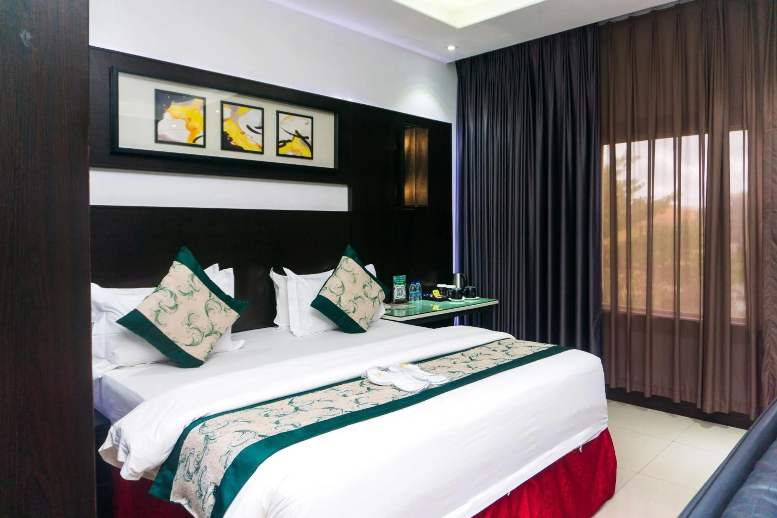 Bed in GreenPoint Hotel