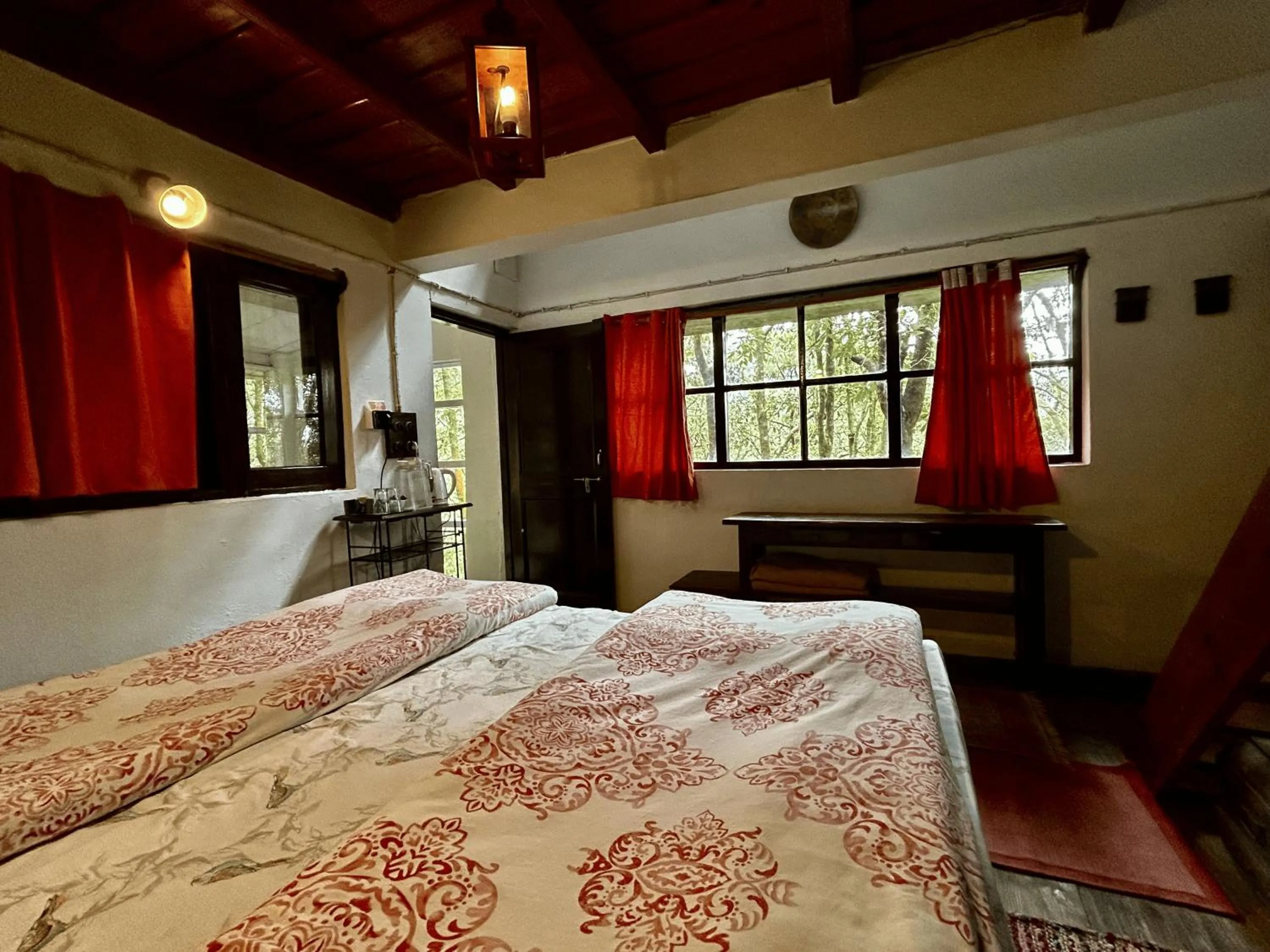 Bed in Jungle Lore Birding Lodge