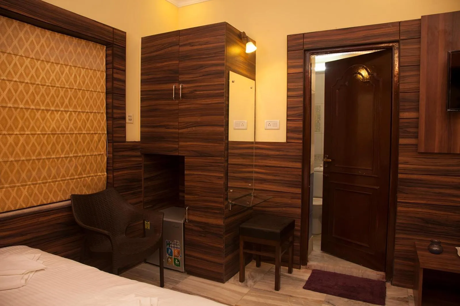 Bed in Om Sai Villa Guesthouse