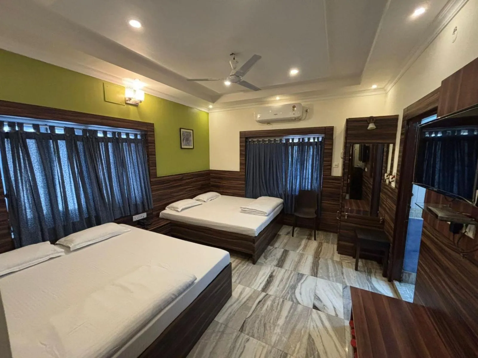 Bed in Om Sai Villa Guesthouse